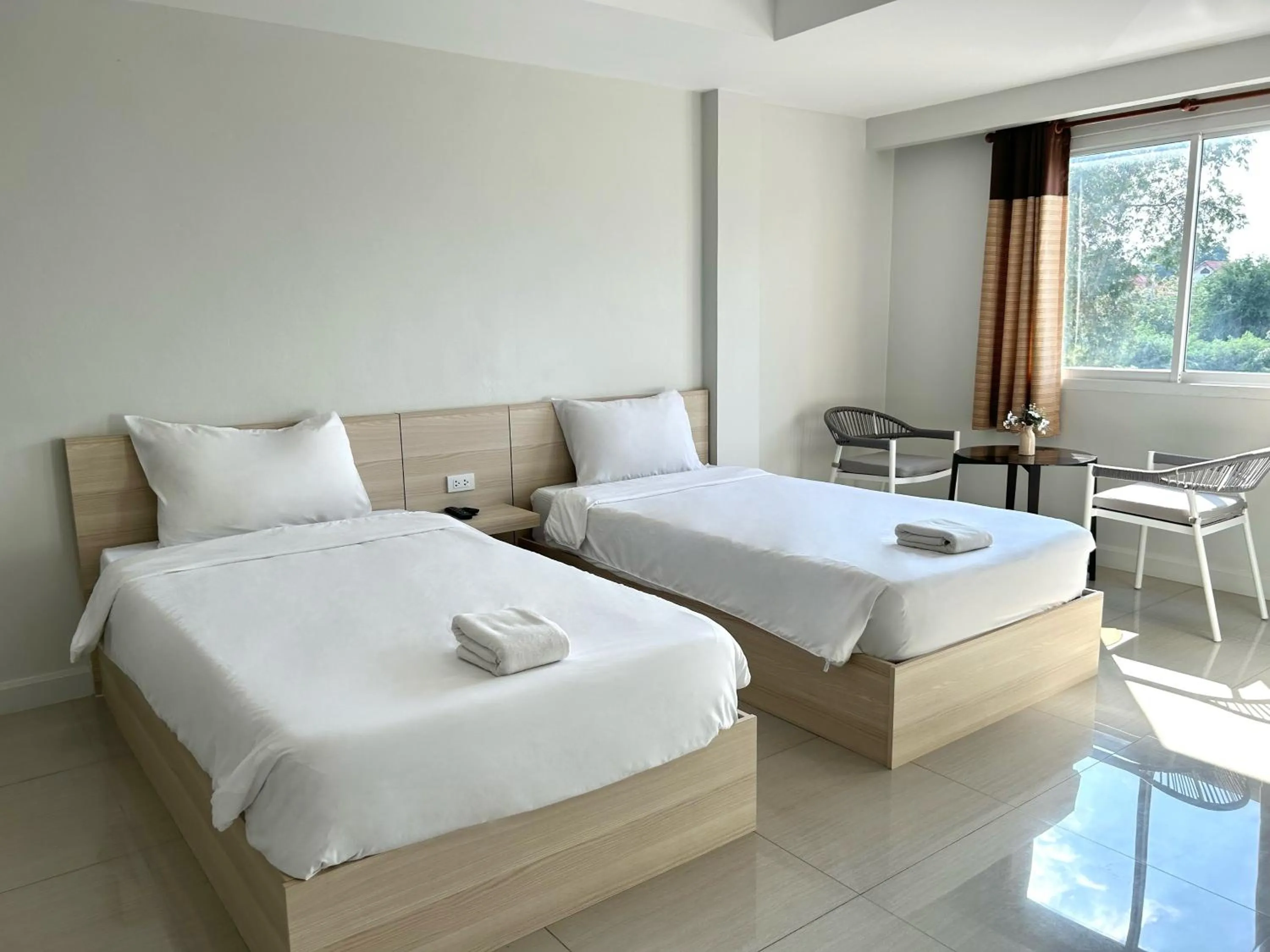 Bed in DD Boutique Resort