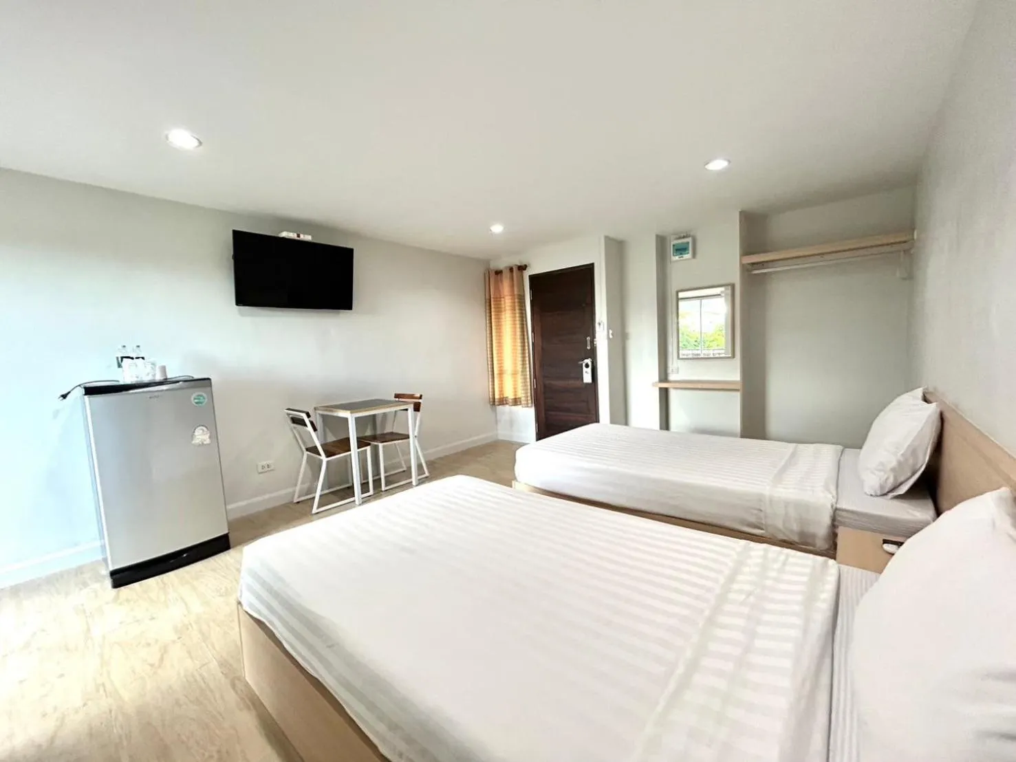 Bed in DD Boutique Resort