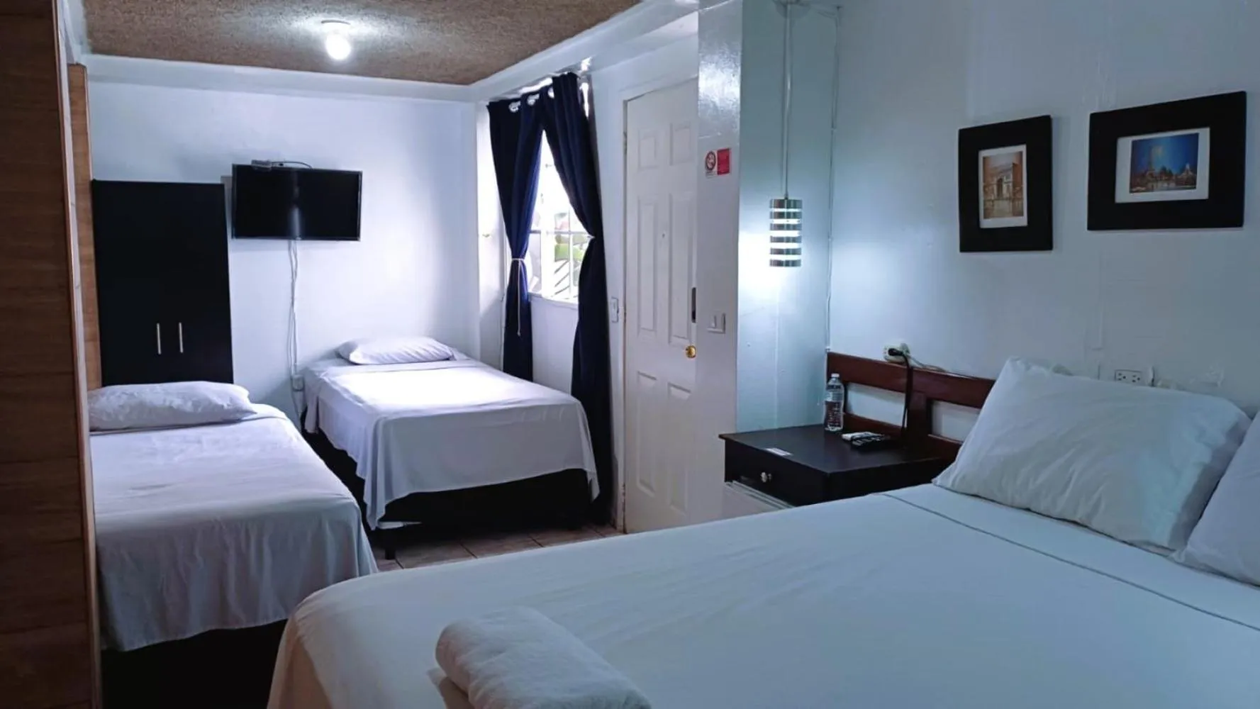 Bed in Hotel Tazumal House