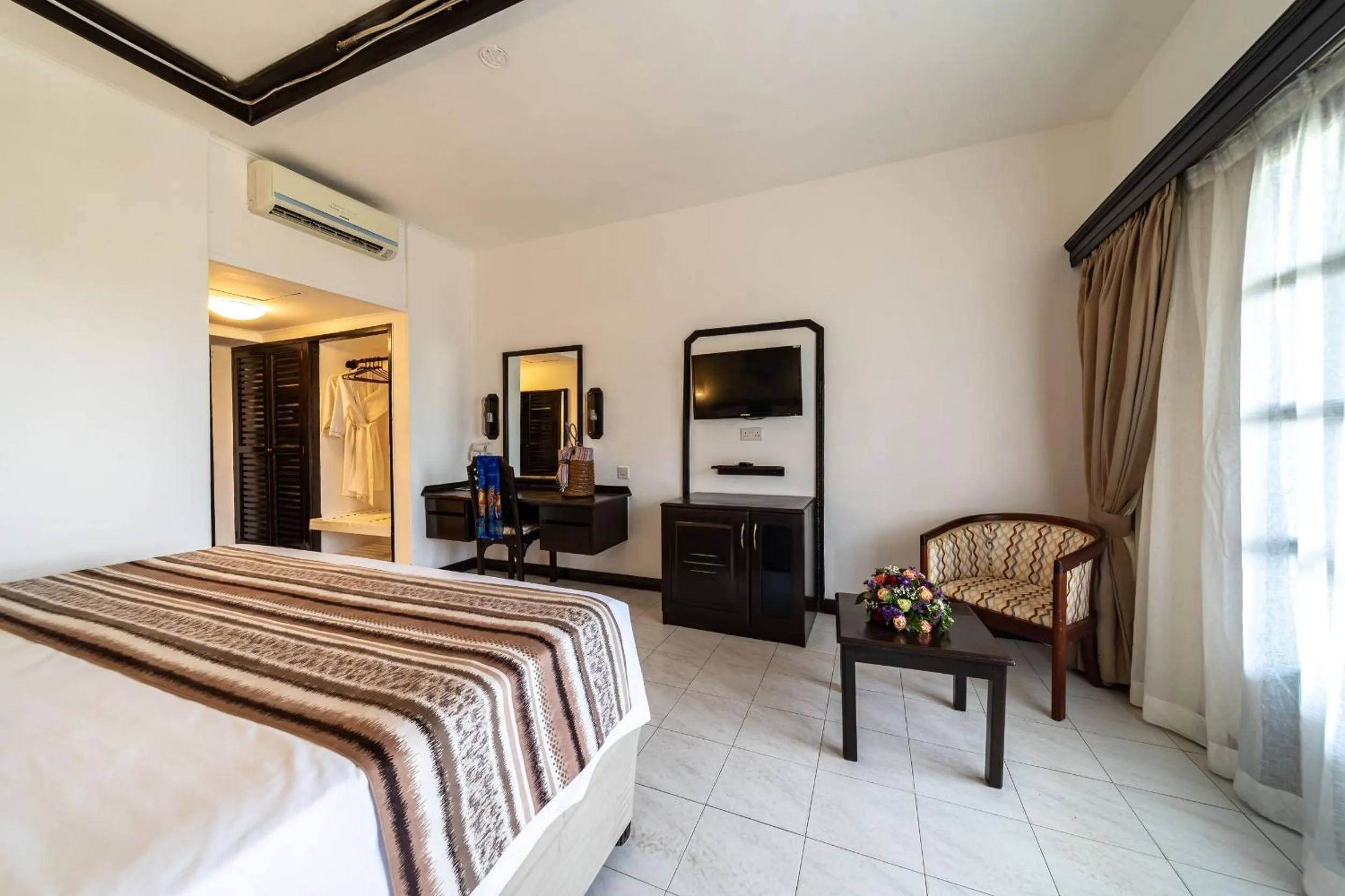 Bed in PrideInn Flamingo Beach Resort & Spa Mombasa