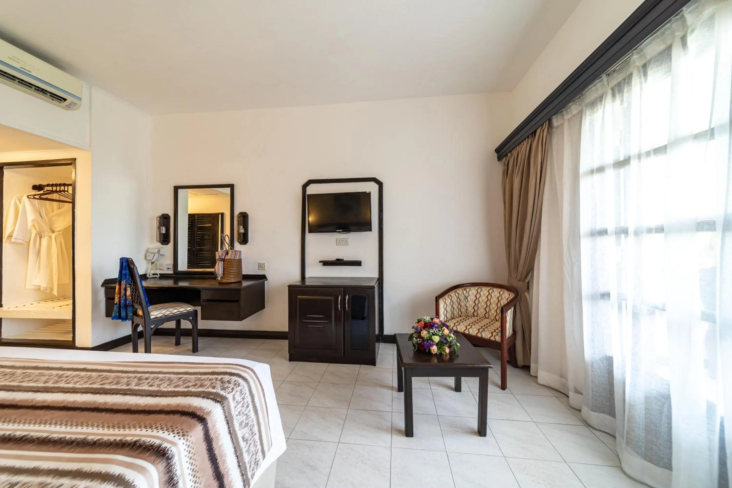 Bed in PrideInn Flamingo Beach Resort & Spa Mombasa