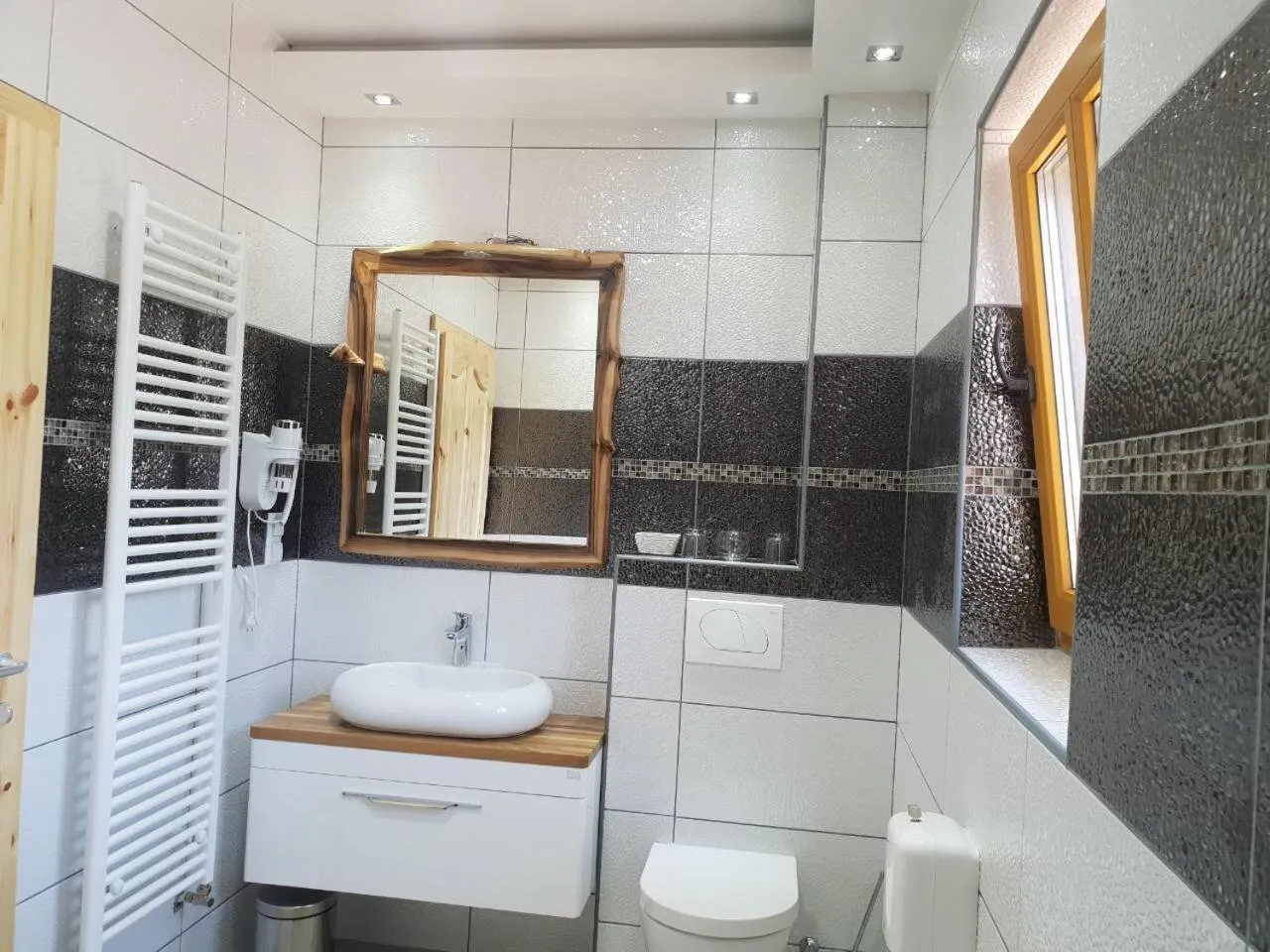 Toilet in Rustic Inn River