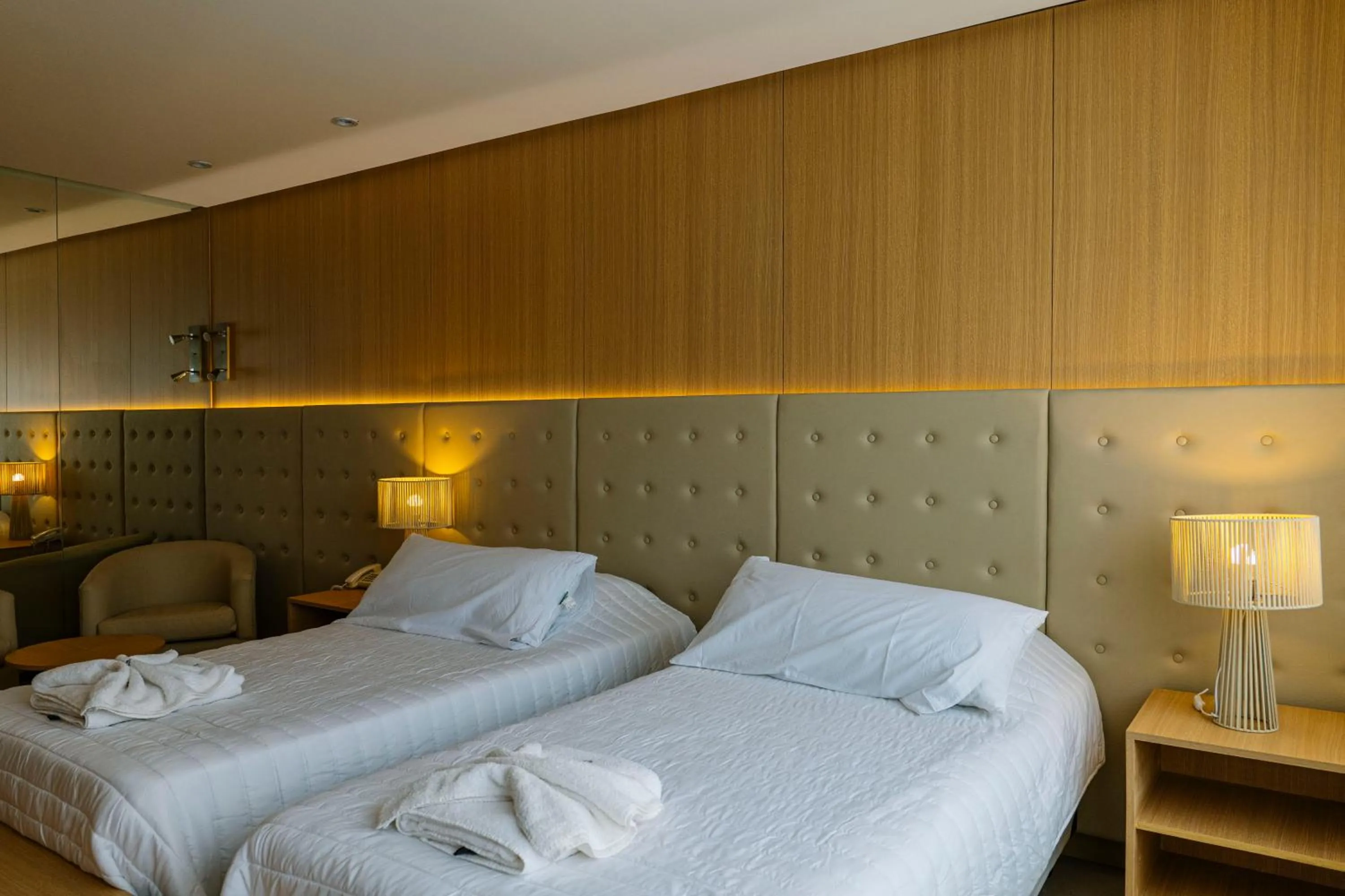 Bed in Plaza Paradiso Petit Hotel