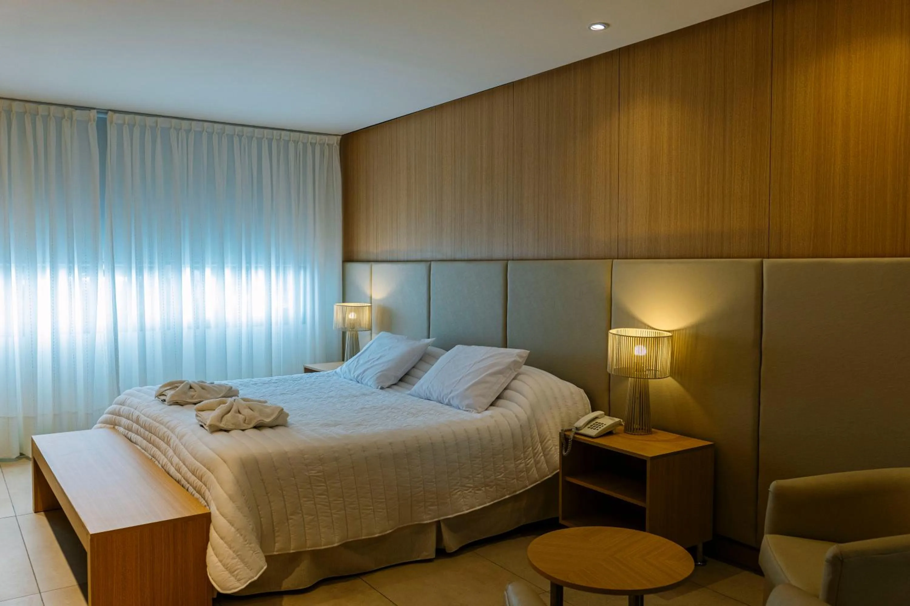 Bed in Plaza Paradiso Petit Hotel