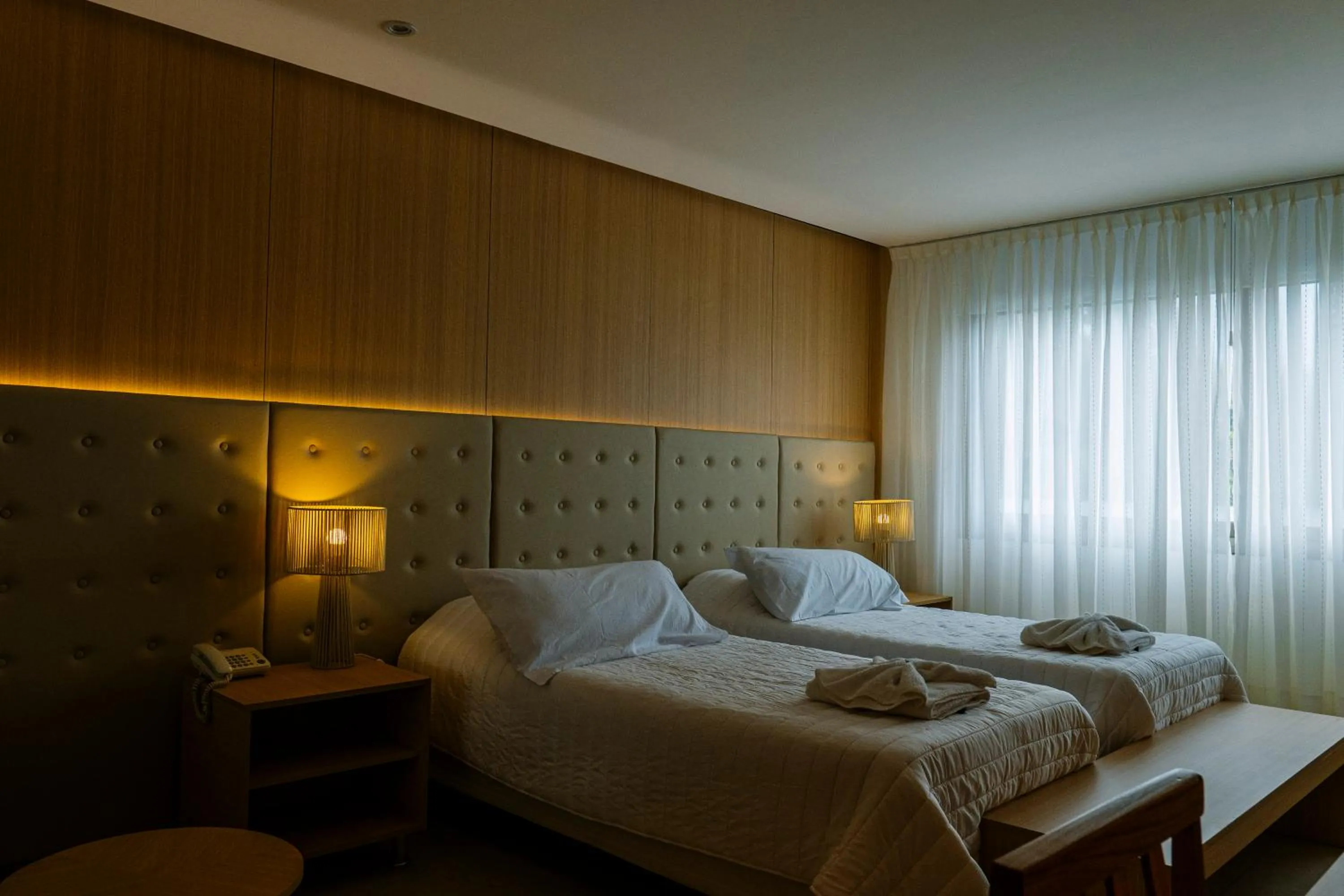 Bed in Plaza Paradiso Petit Hotel