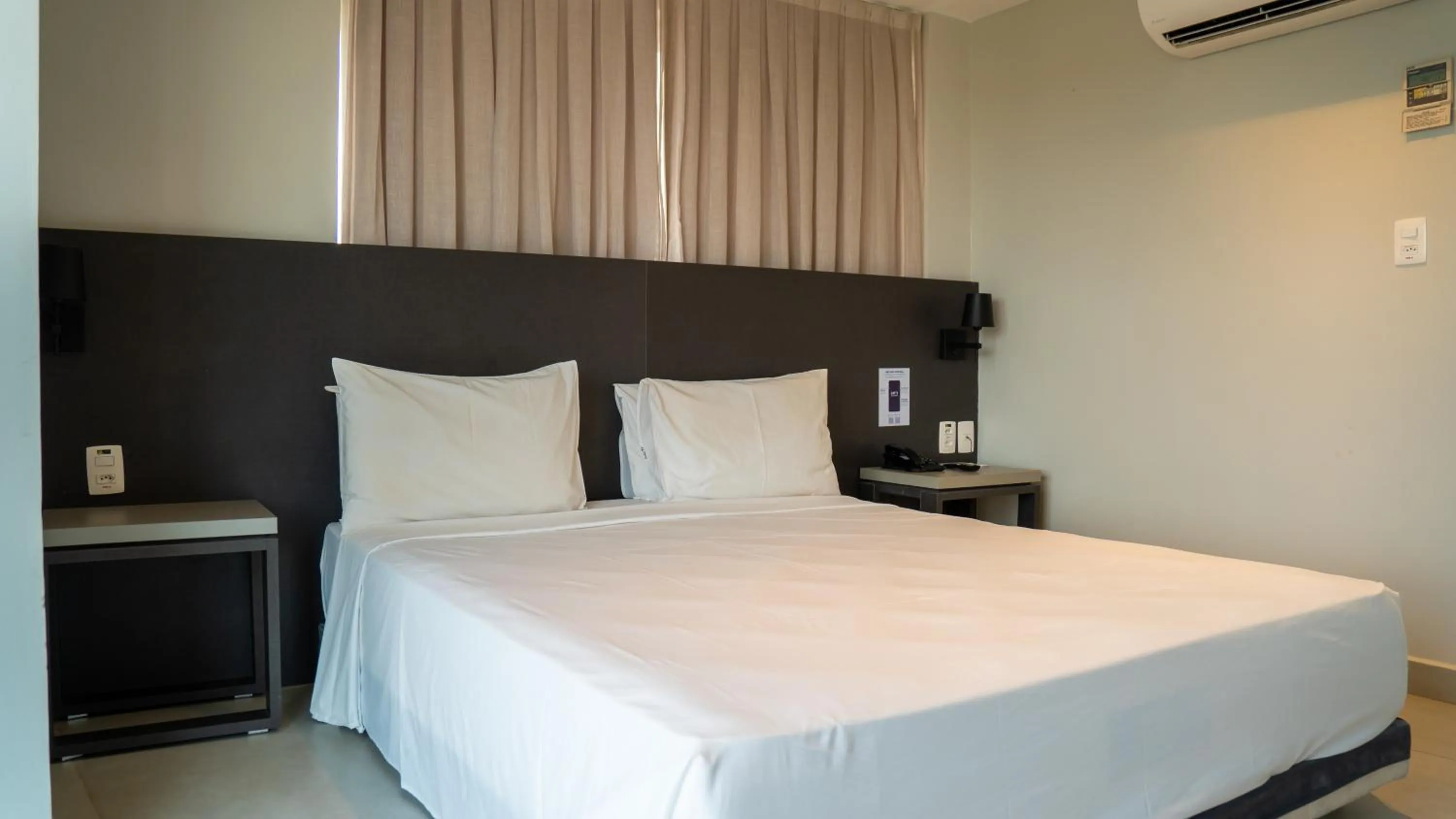 Bed in Quality Suítes João Pessoa