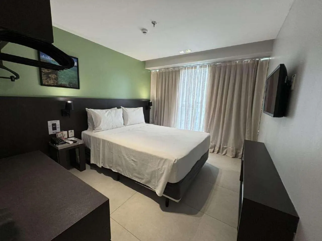 Bed in Quality Suítes João Pessoa