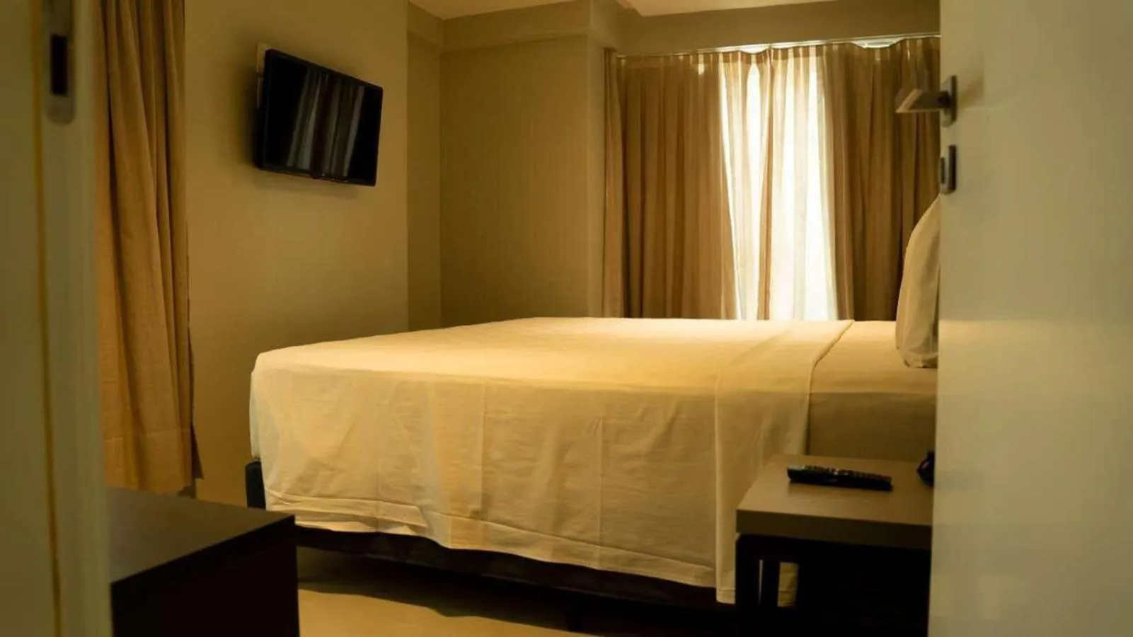 Bed in Quality Suítes João Pessoa