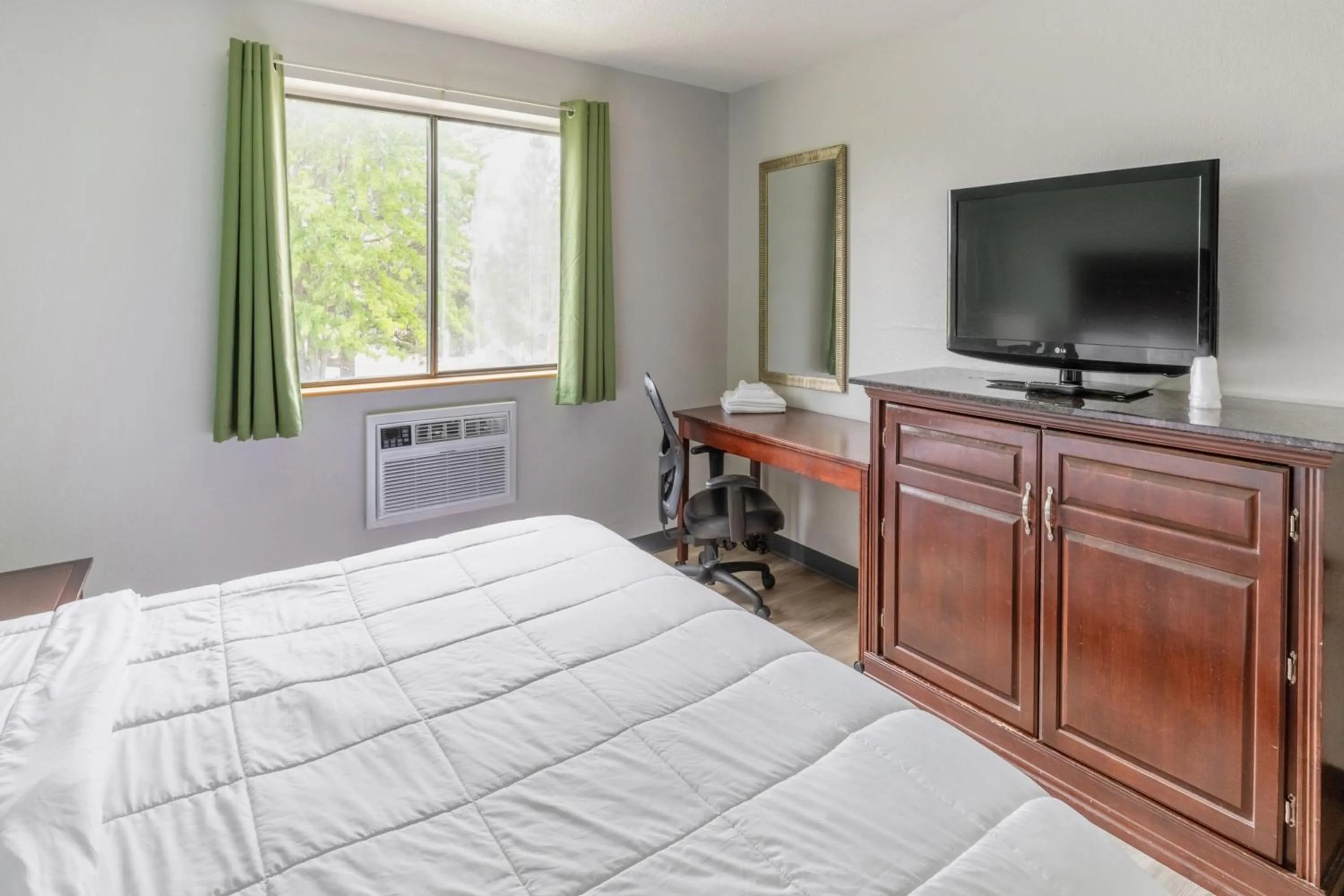 Bedroom, Bed in Super Inn by OYO Lansing MI