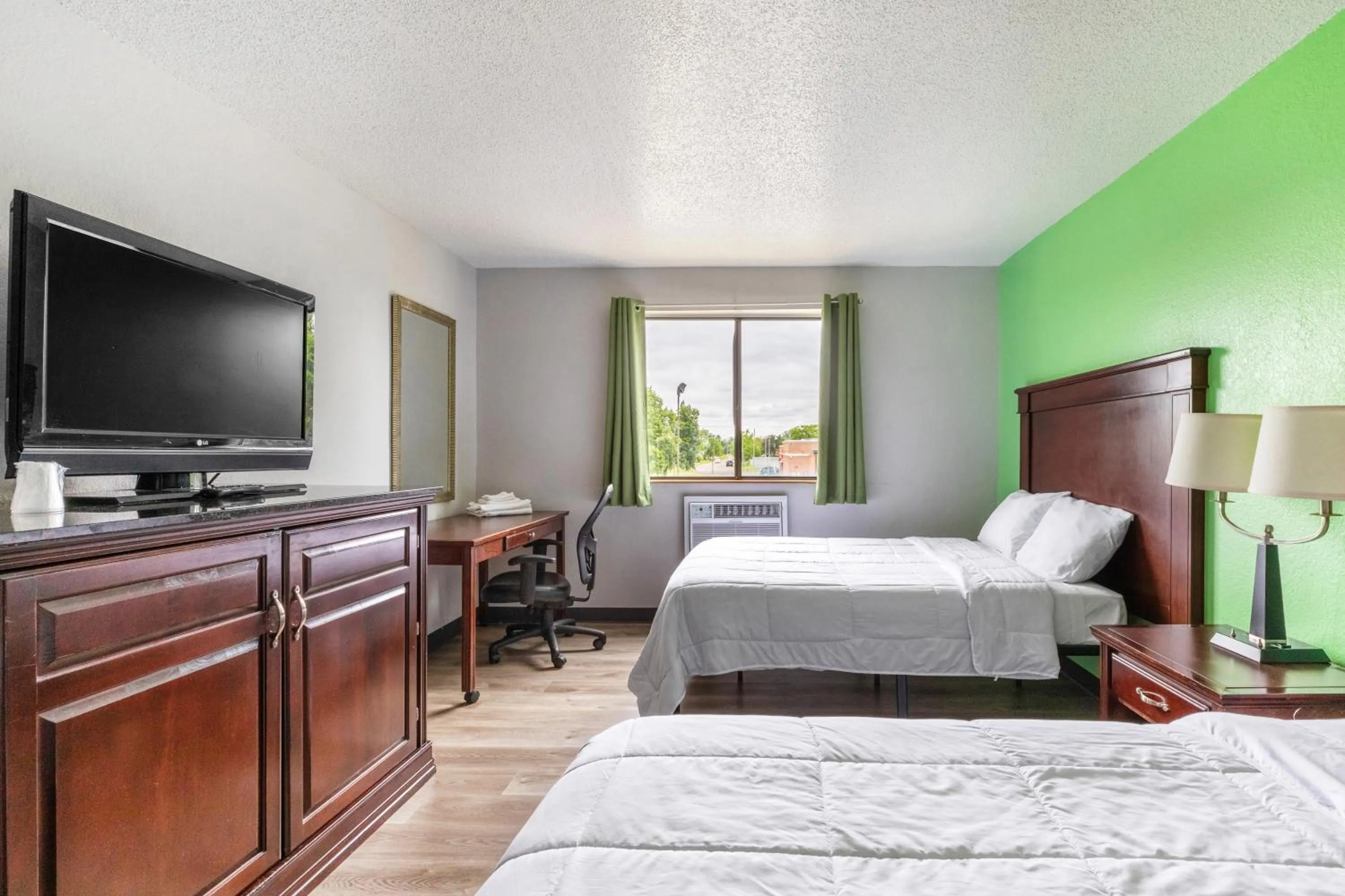 Bedroom, Bed in Super Inn by OYO Lansing MI