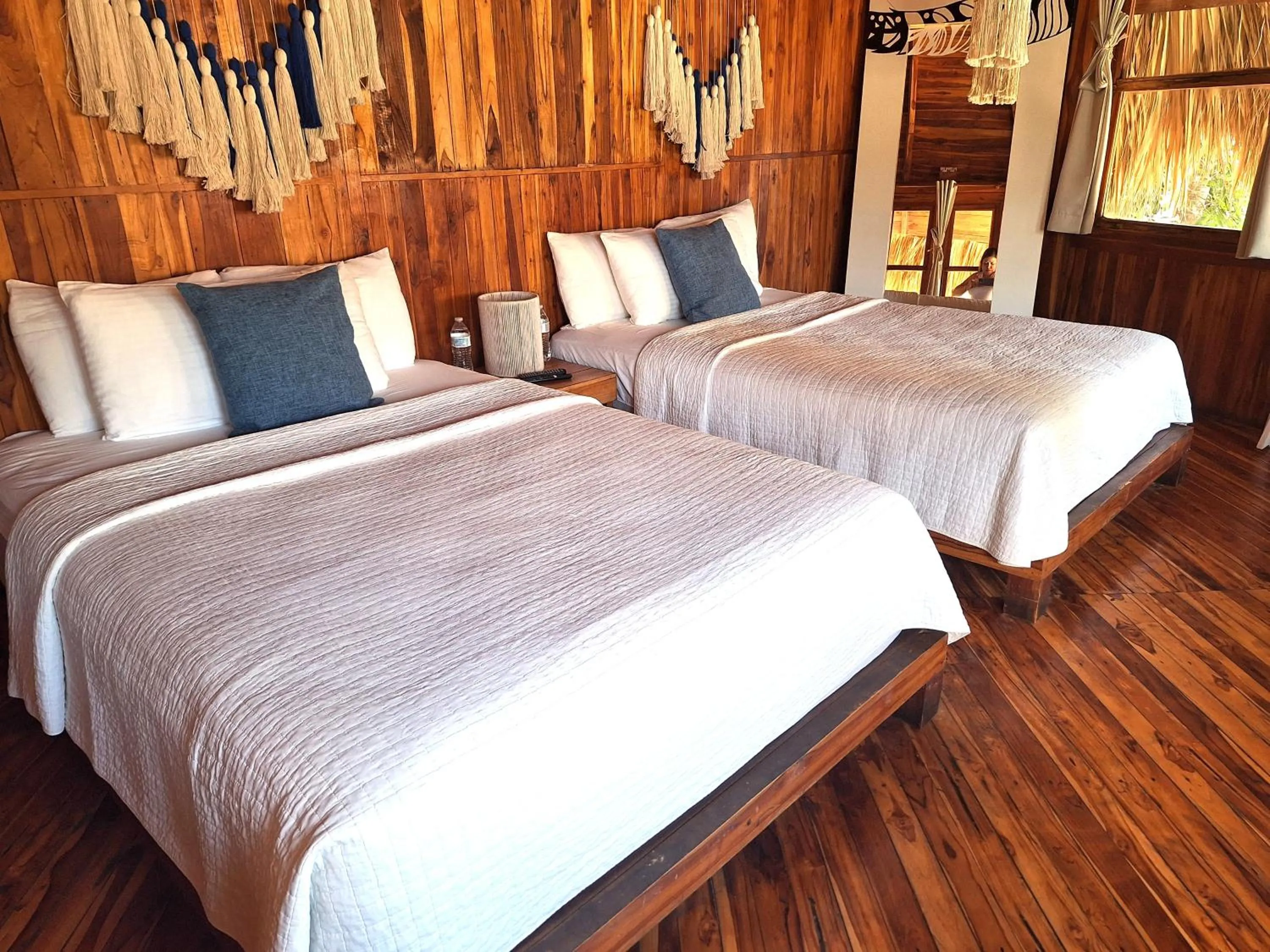 Bed in Hotel Tortuga Village