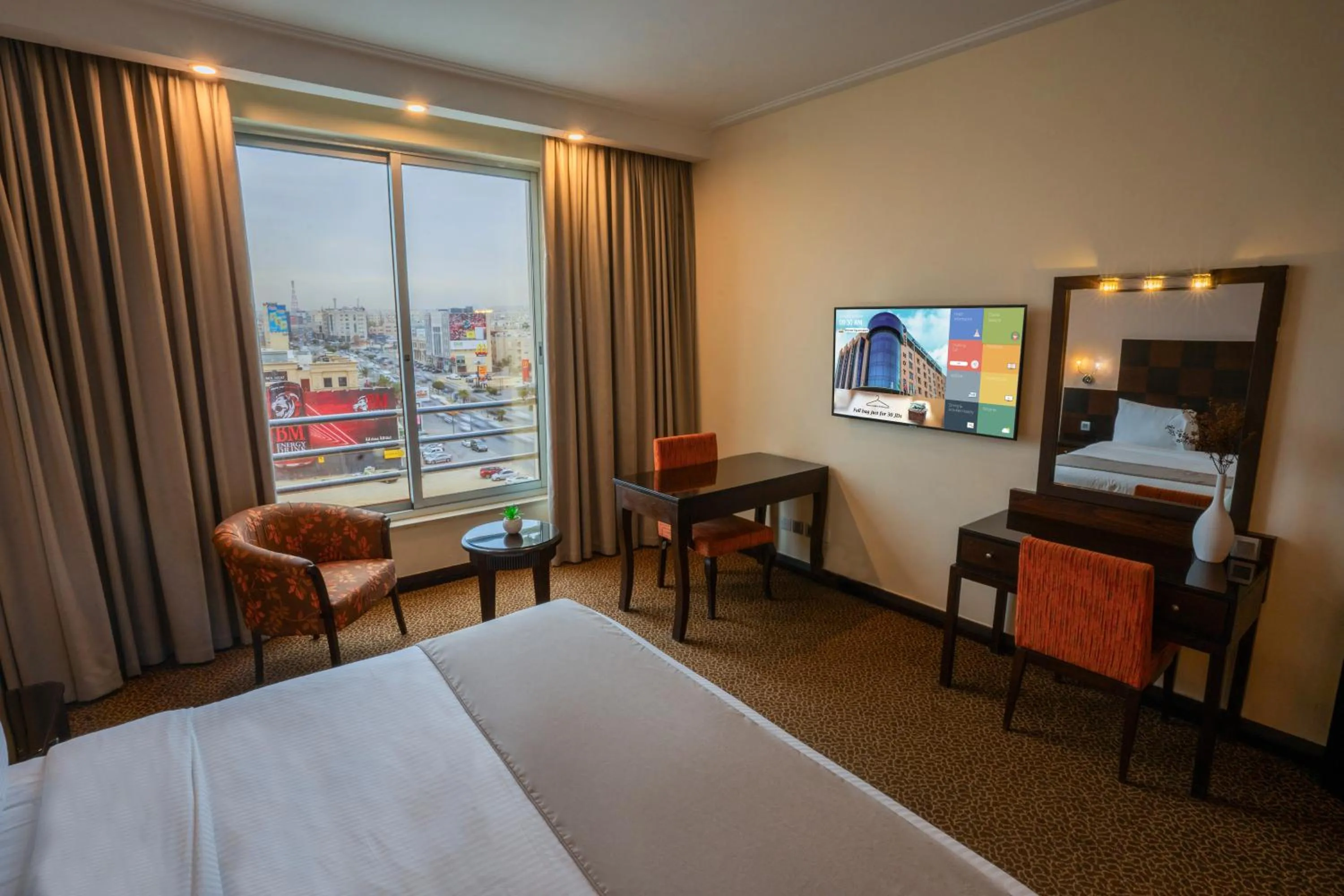 Communal lounge/ TV room, Bed in Ayass Hotel