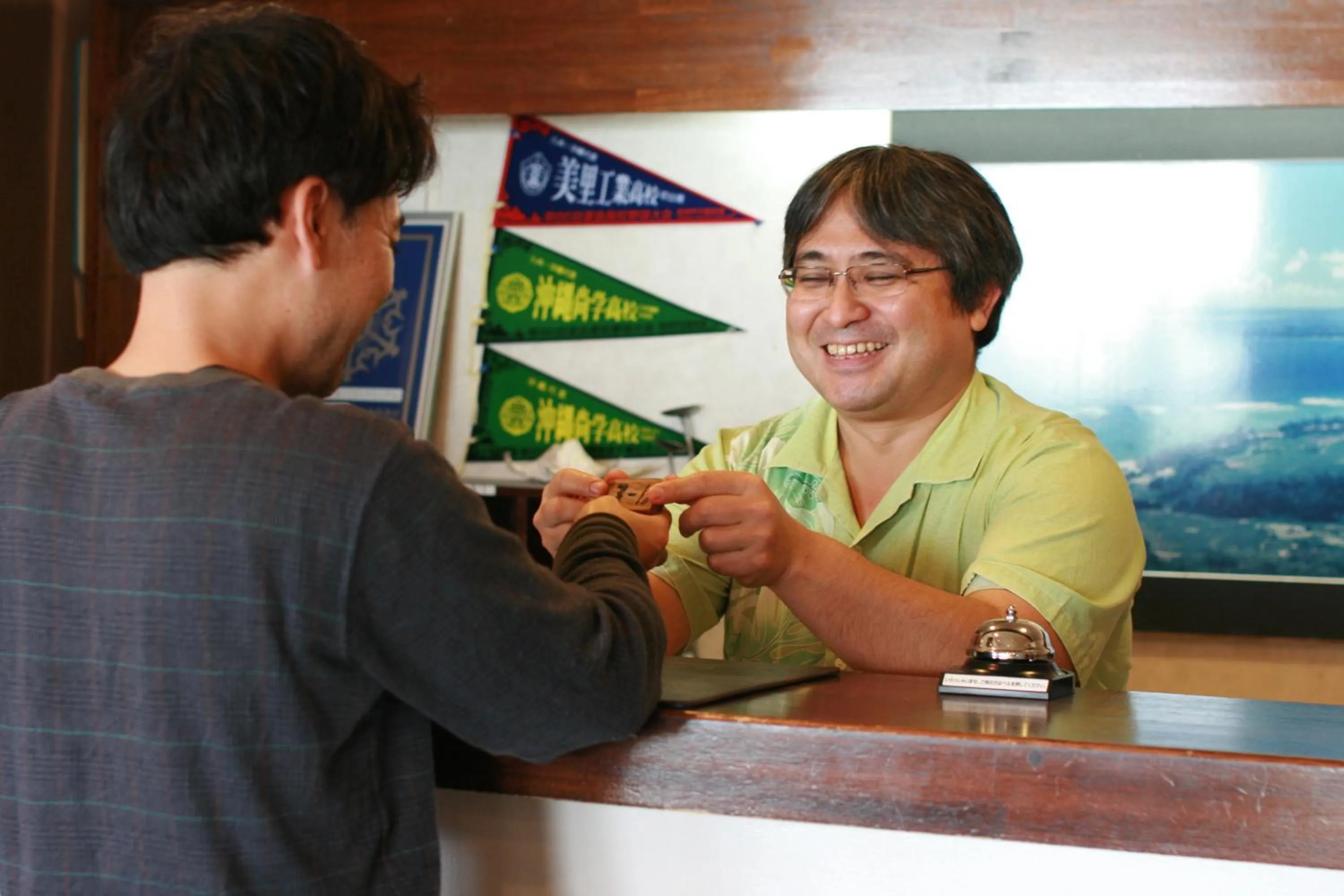 Staff in Hotel & Restaurant On the Beach Lue