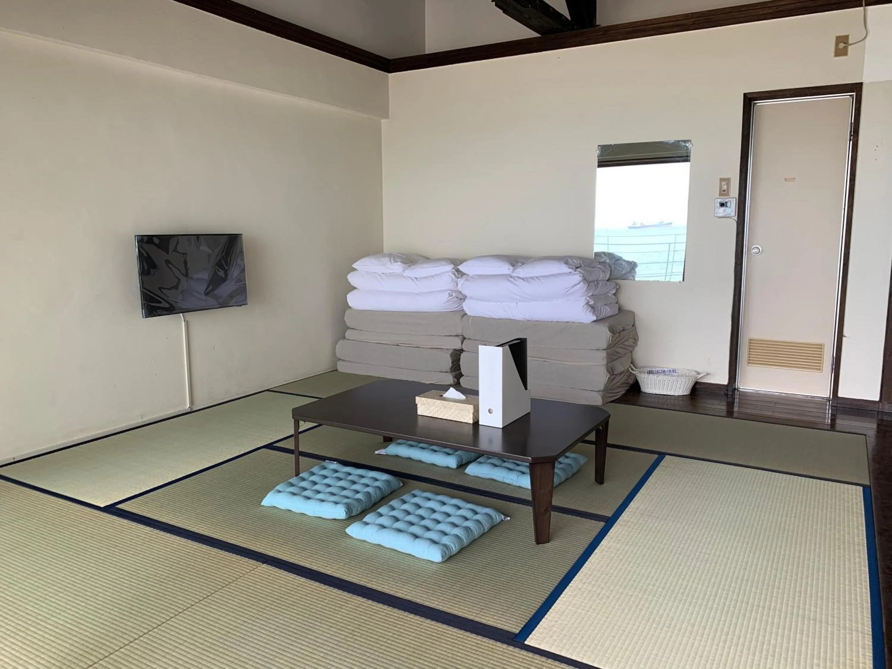 Photo of the whole room, Bed in Hotel & Restaurant On the Beach Lue