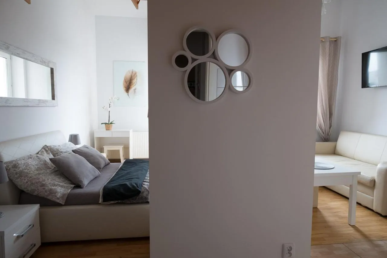 Living room, Bed in Apartamenty Trzy Wieze