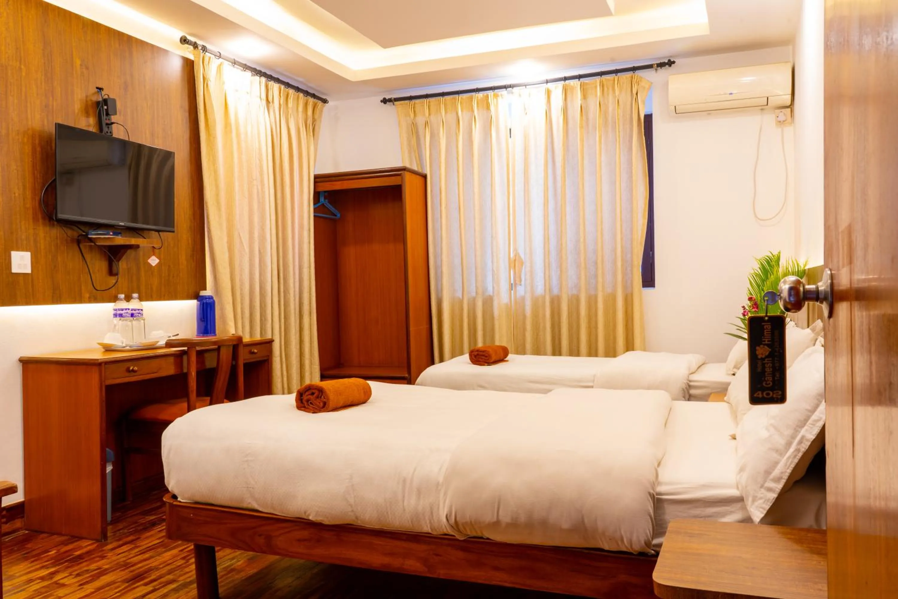 TV and multimedia, Bed in Hotel Ganesh Himal