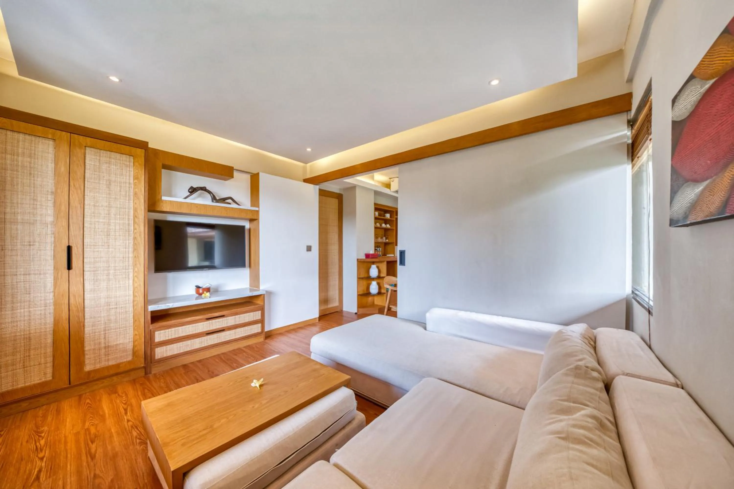 Living room, Bed in Sejuk Suites