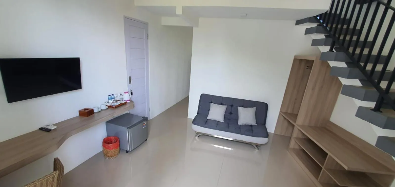 TV and multimedia in Nipuri Resort and Villas Seminyak by Kamara