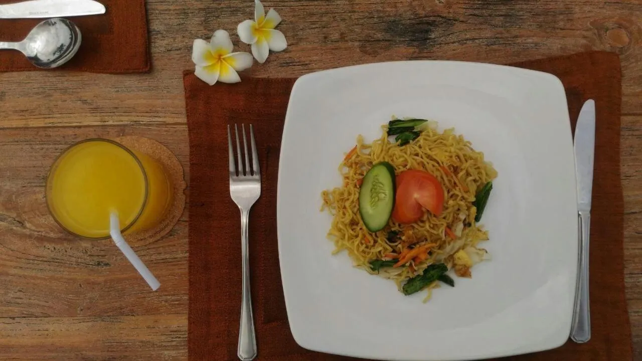 Asian breakfast in Nipuri Resort and Villas Seminyak by Kamara