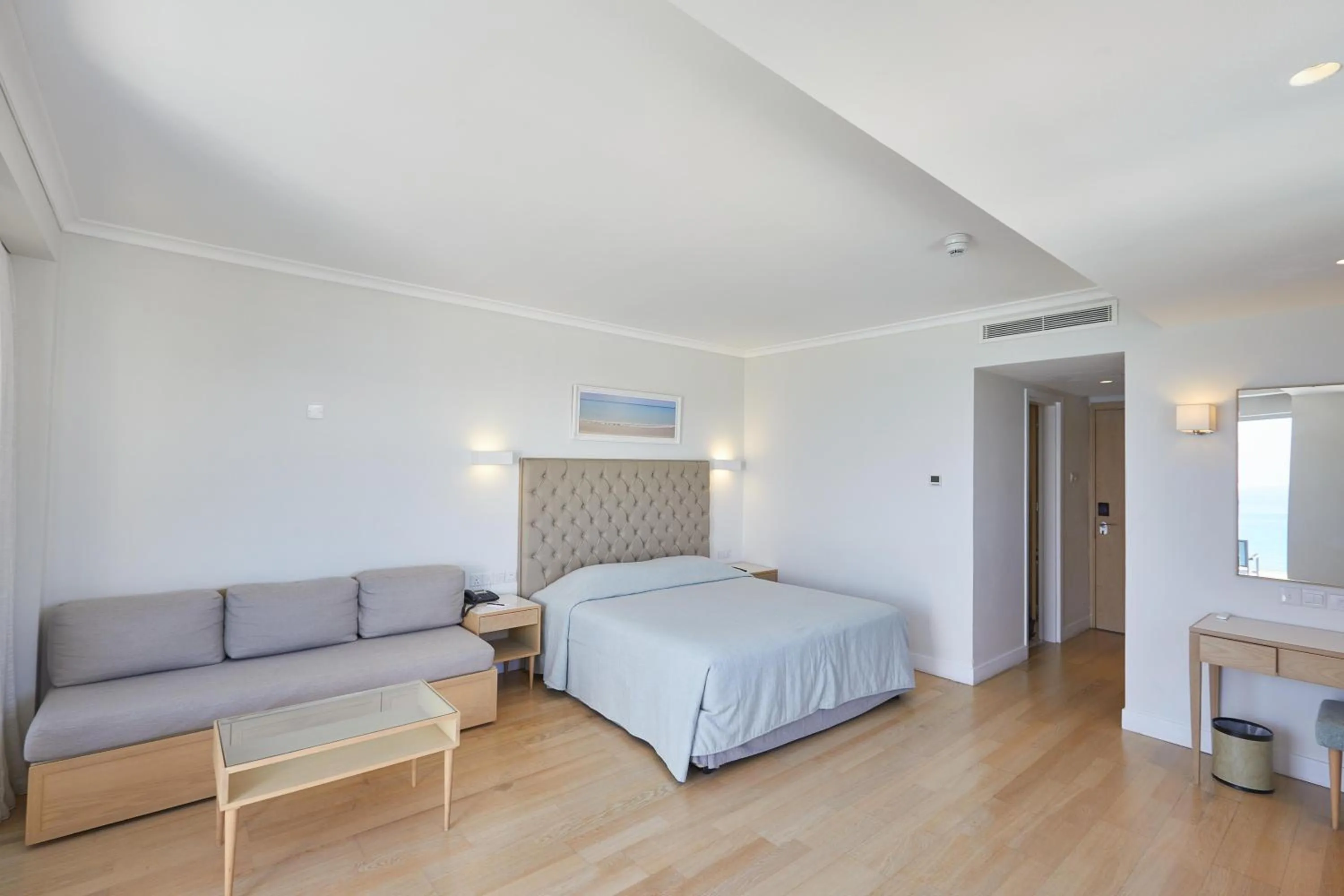 Photo of the whole room, Bed in Sunrise Beach Hotel