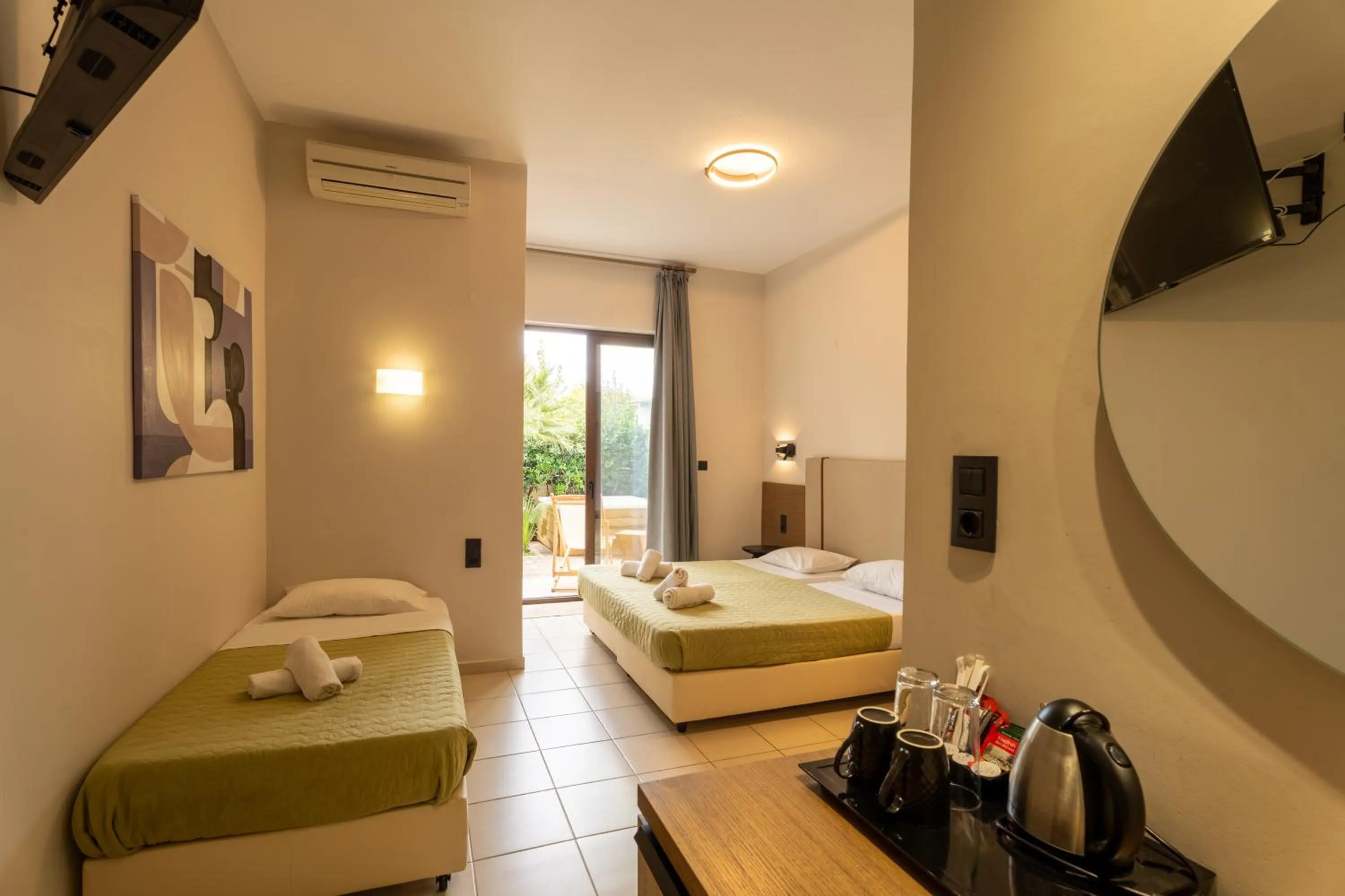 Bedroom, Bed in Dimitra Hotel & Apartments by Omilos Hotels