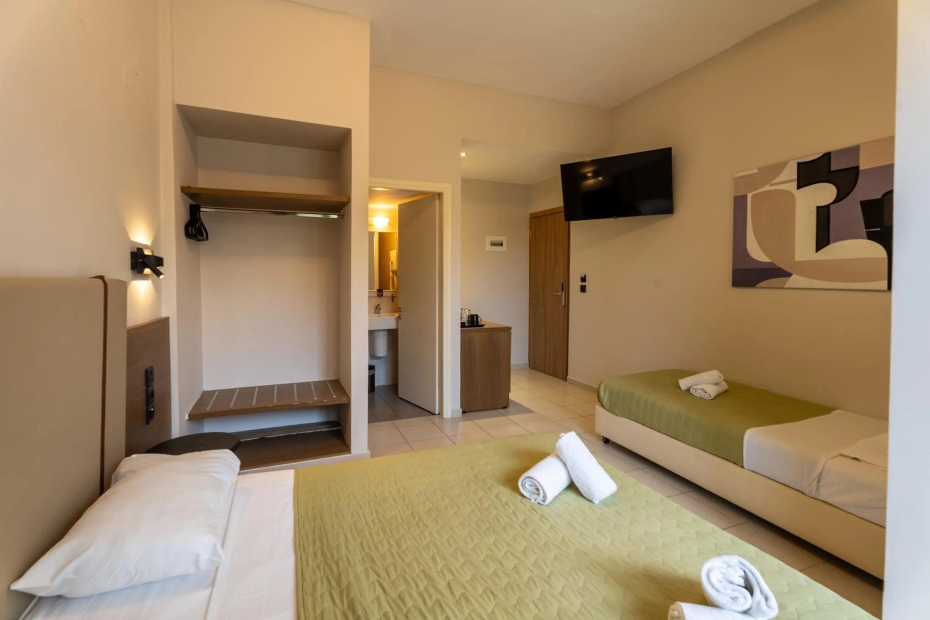 Bedroom, Bed in Dimitra Hotel & Apartments by Omilos Hotels