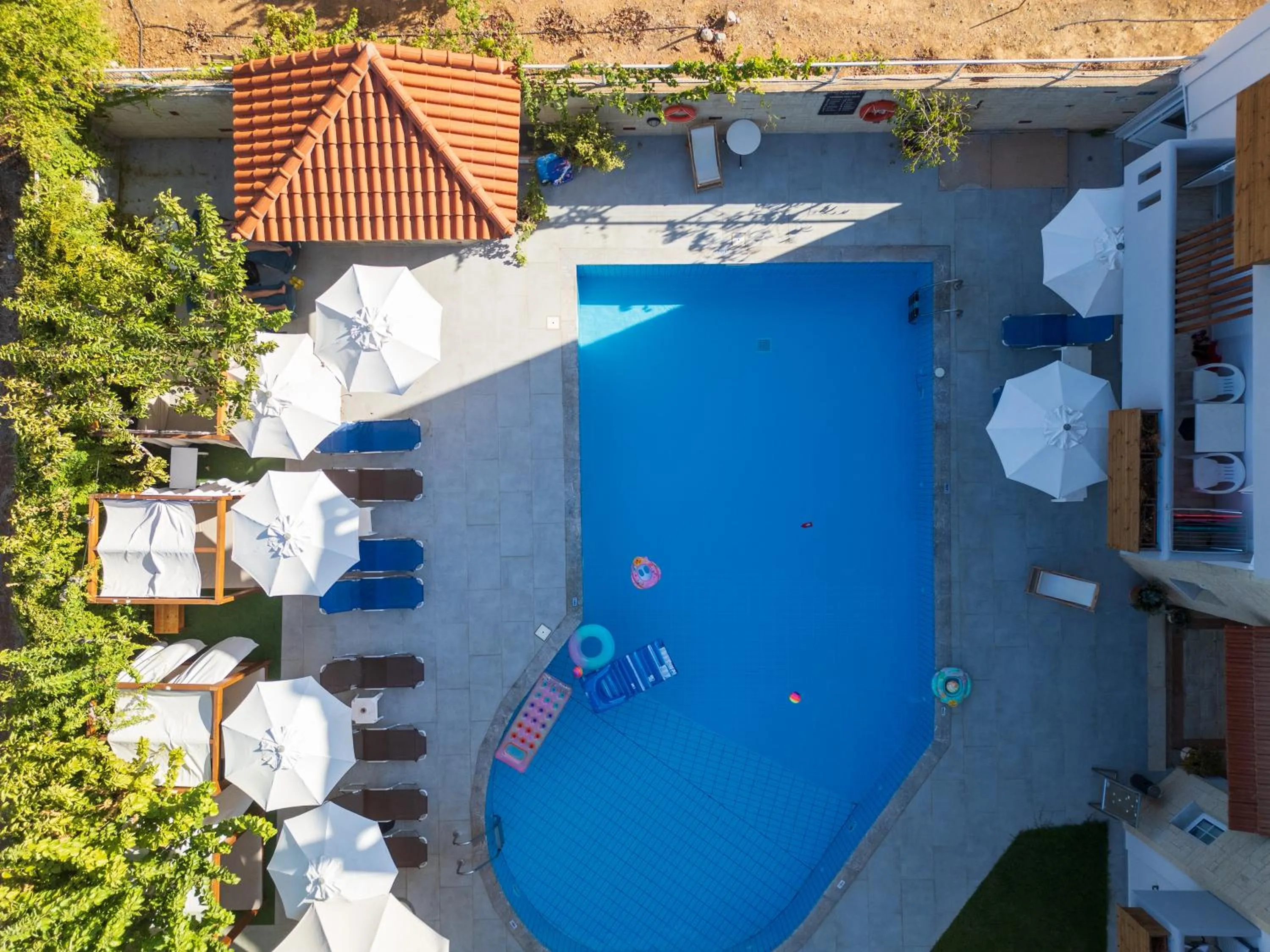 Swimming pool in Dimitra Hotel & Apartments by Omilos Hotels