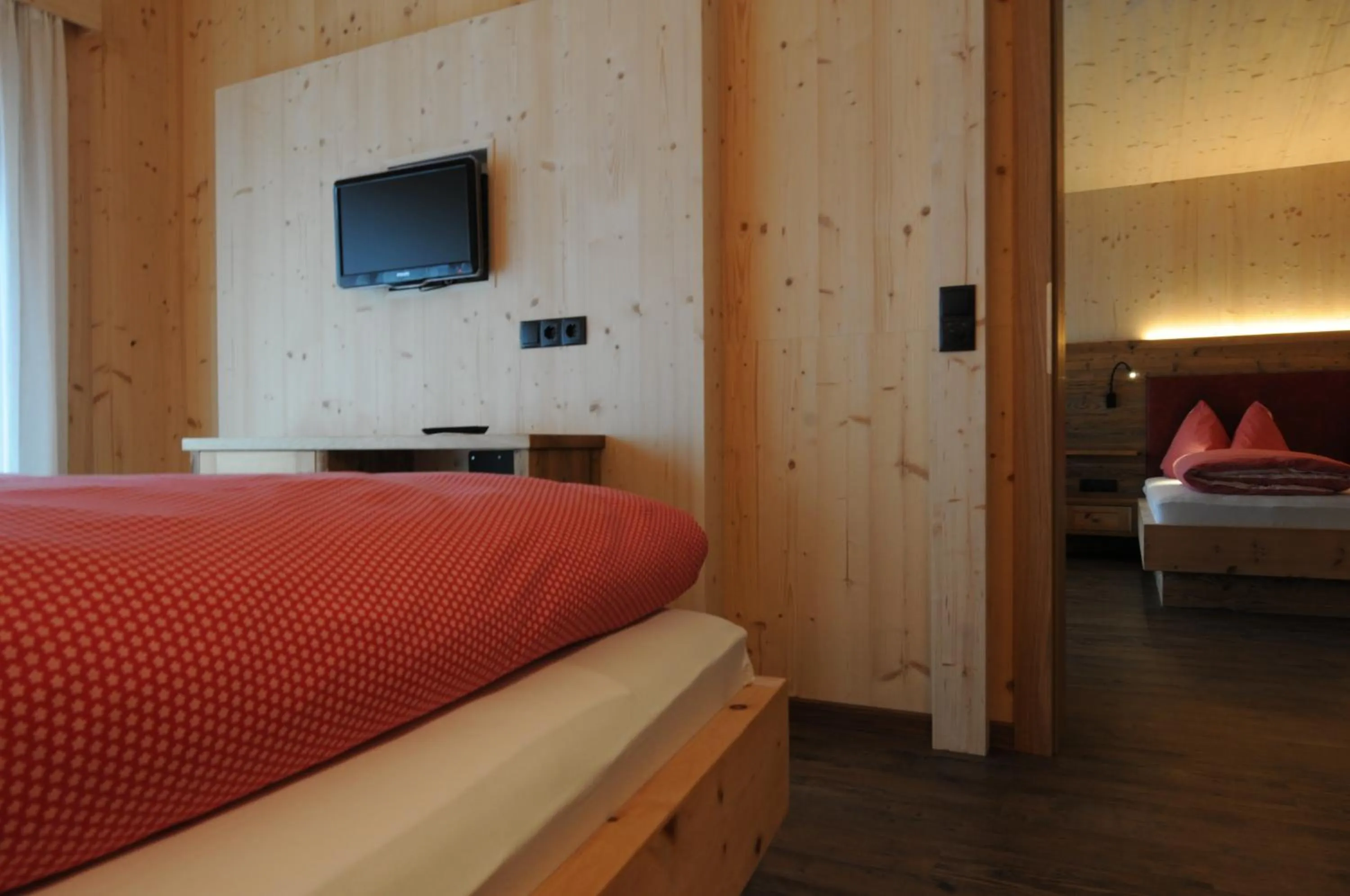 Photo of the whole room, Bed in Naturhotel Haller