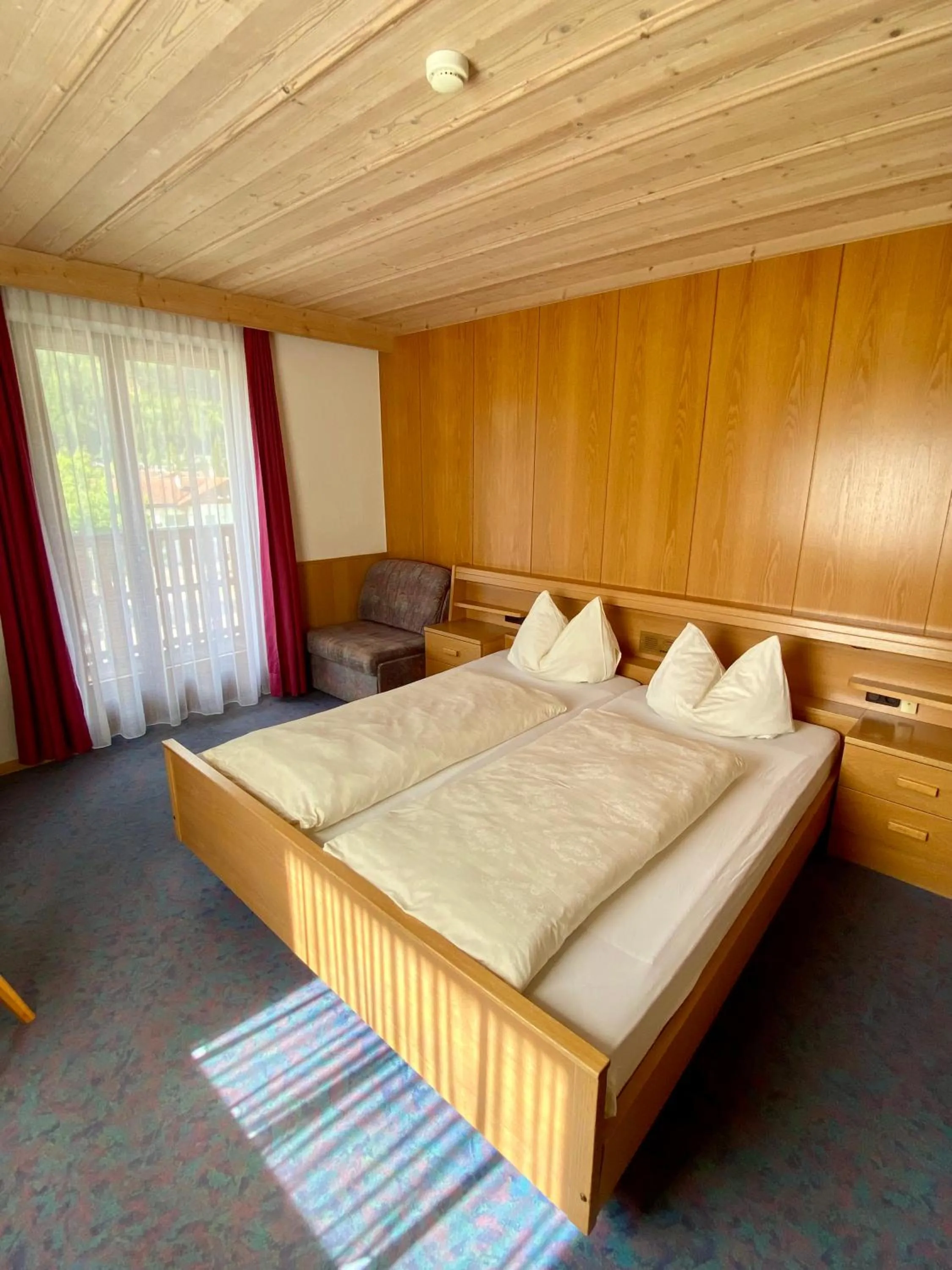 Photo of the whole room, Bed in Naturhotel Haller