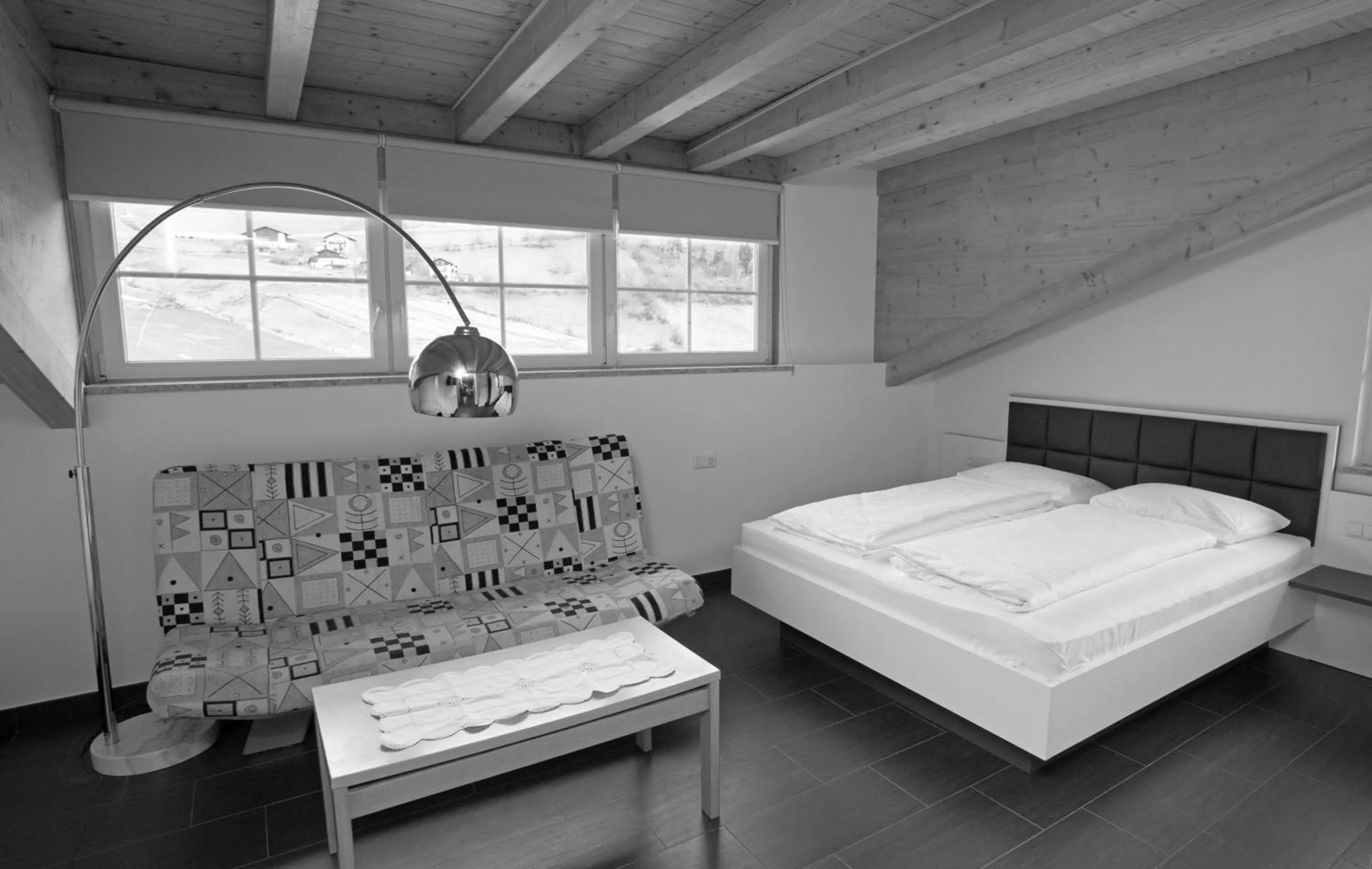 Photo of the whole room, Bed in Residence Sonneck