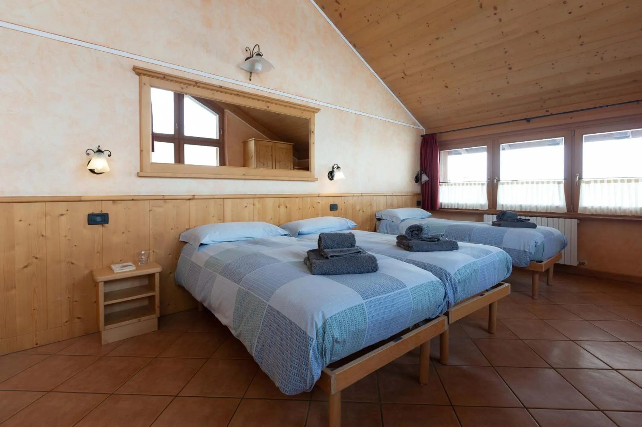 Bed in La Grolla Rooms & Apartments