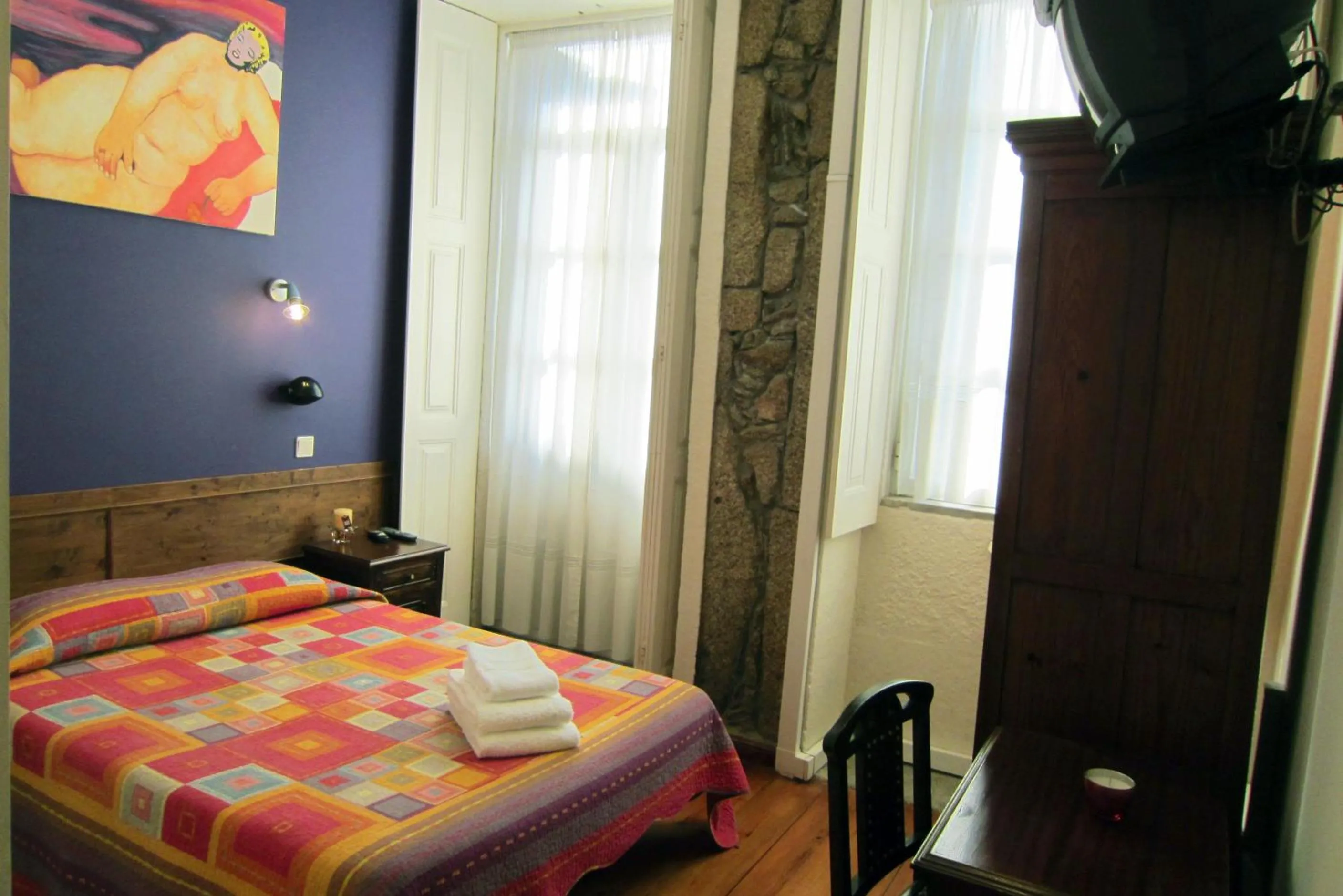 Bed in Duas Nações Guest House