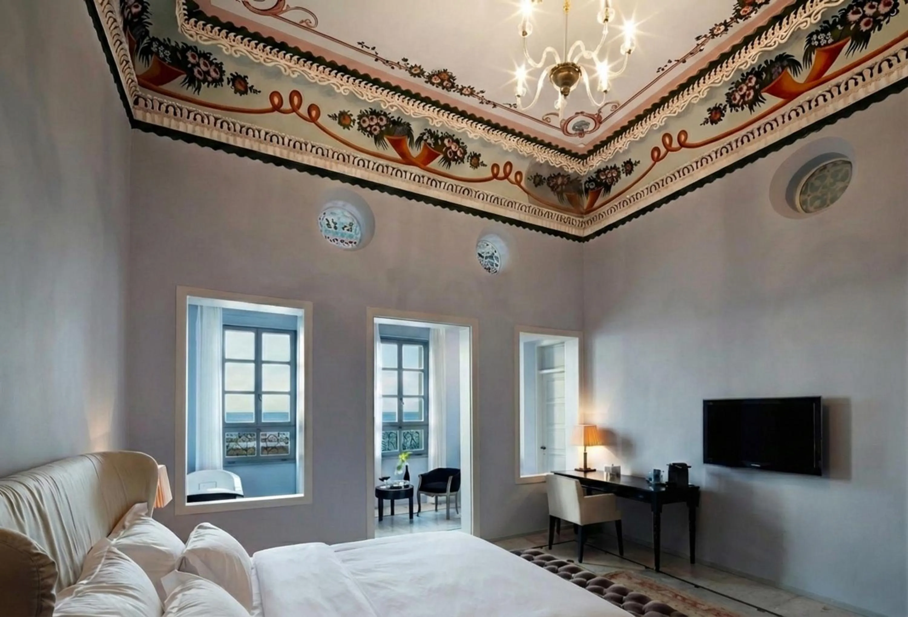 Communal lounge/ TV room, Bed in The Efendi Hotel Akko