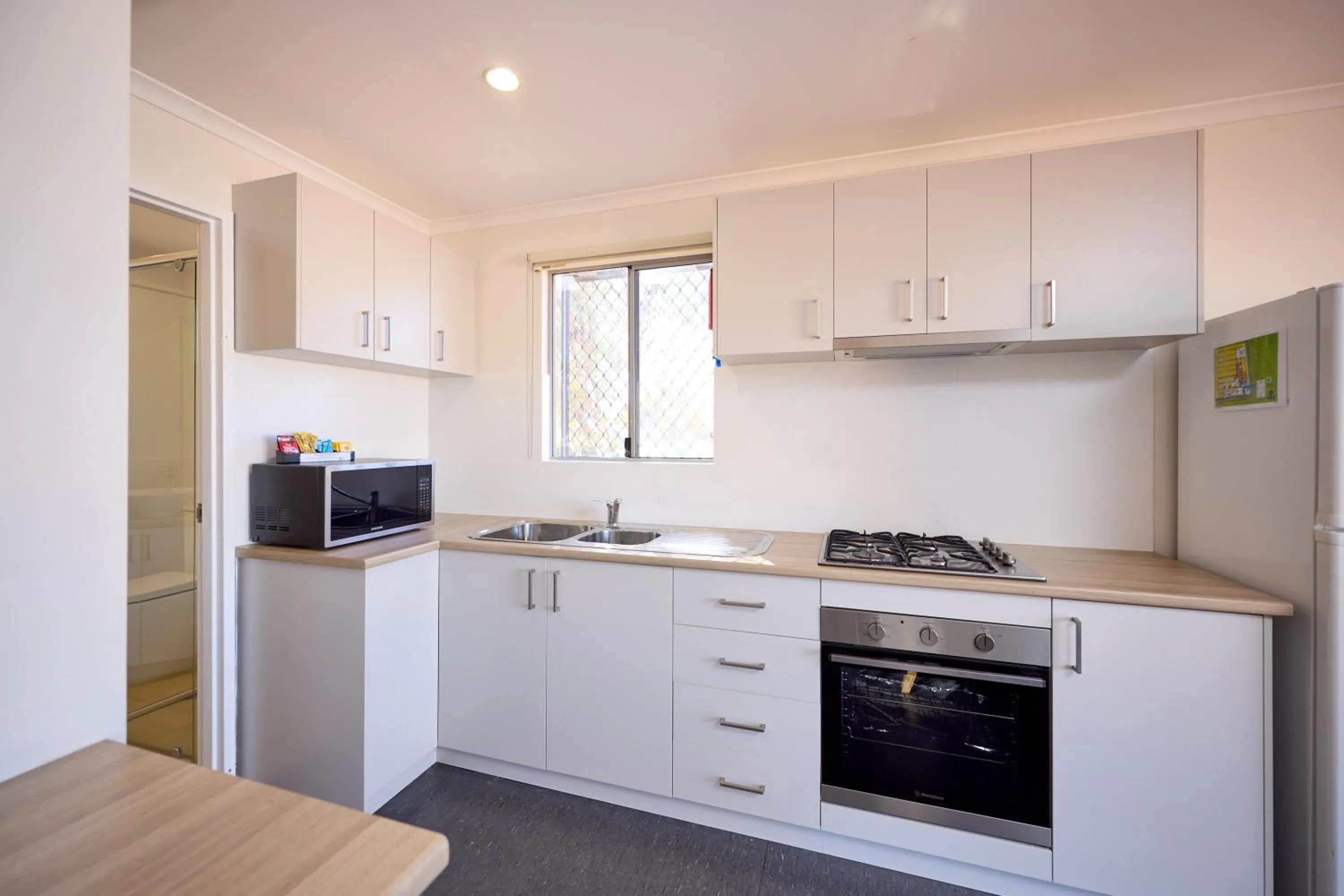 Kitchen or kitchenette in RAC Exmouth Cape Holiday Park
