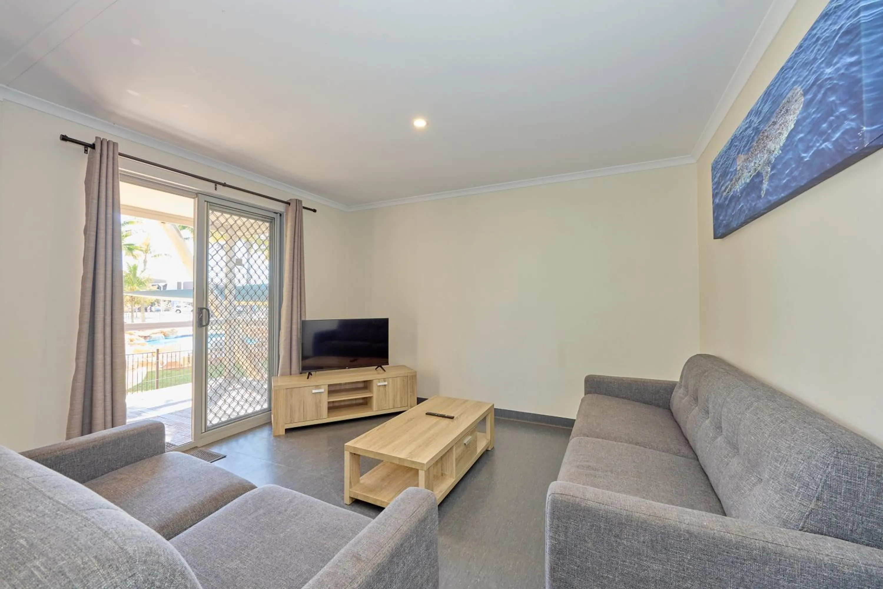 Communal lounge/ TV room in RAC Exmouth Cape Holiday Park