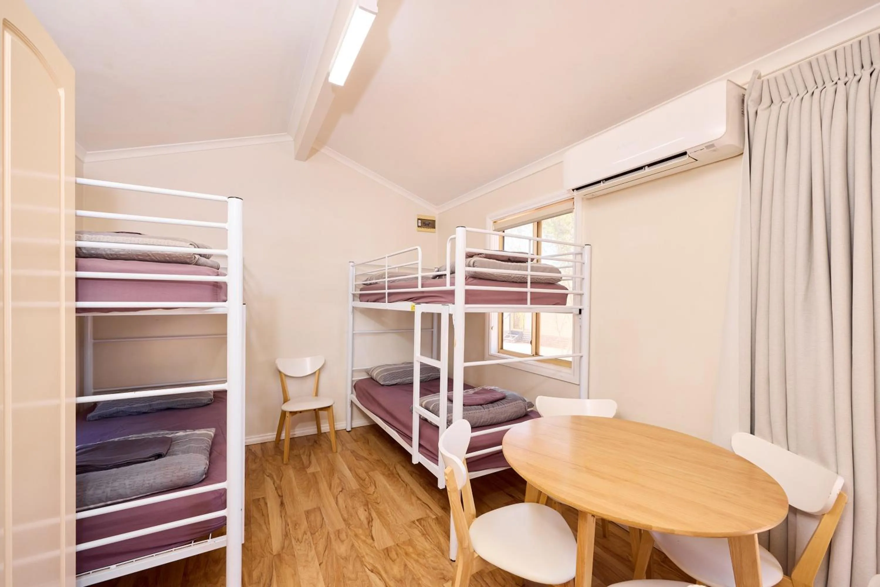 Photo of the whole room, Bed in RAC Exmouth Cape Holiday Park