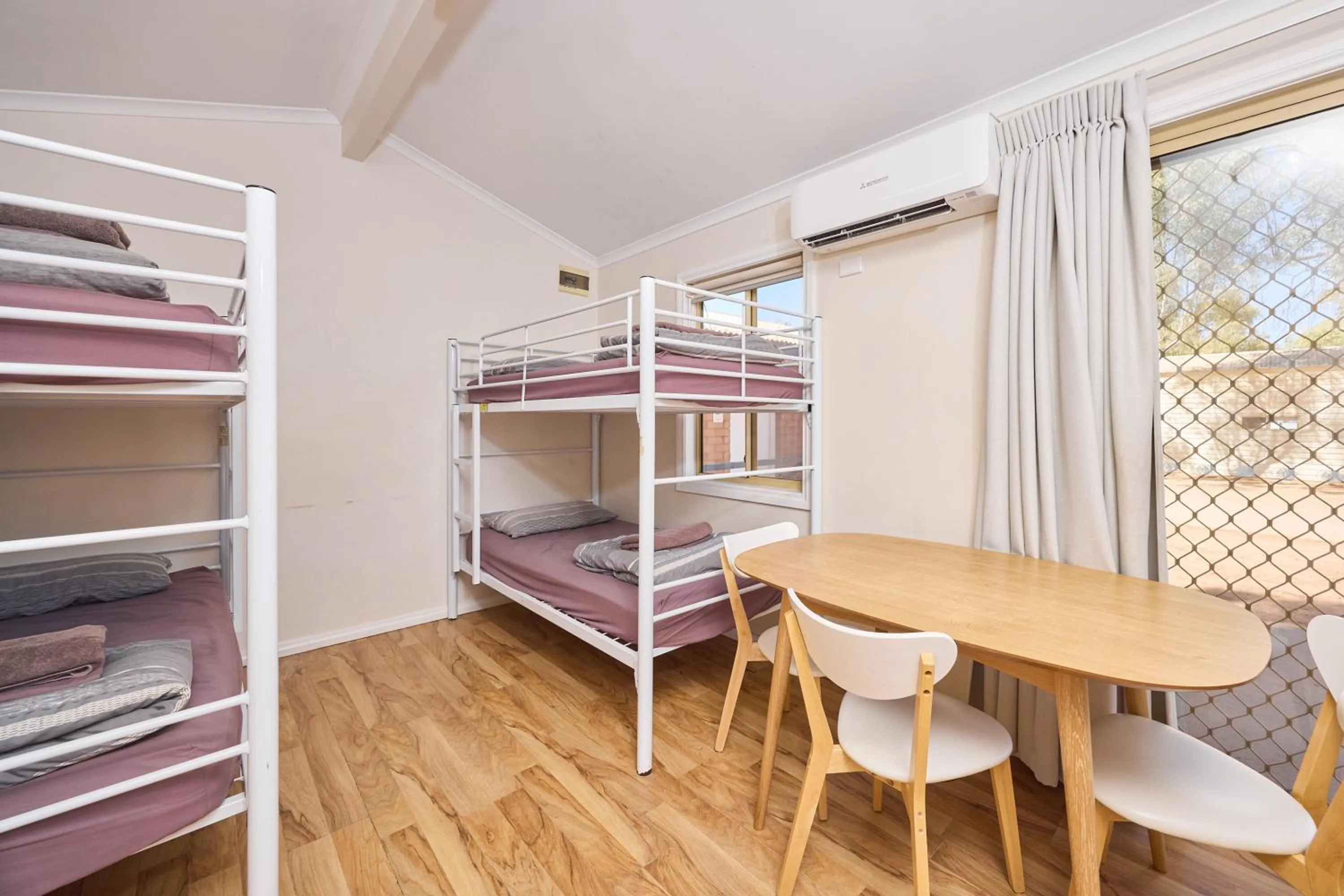 Photo of the whole room, Bed in RAC Exmouth Cape Holiday Park