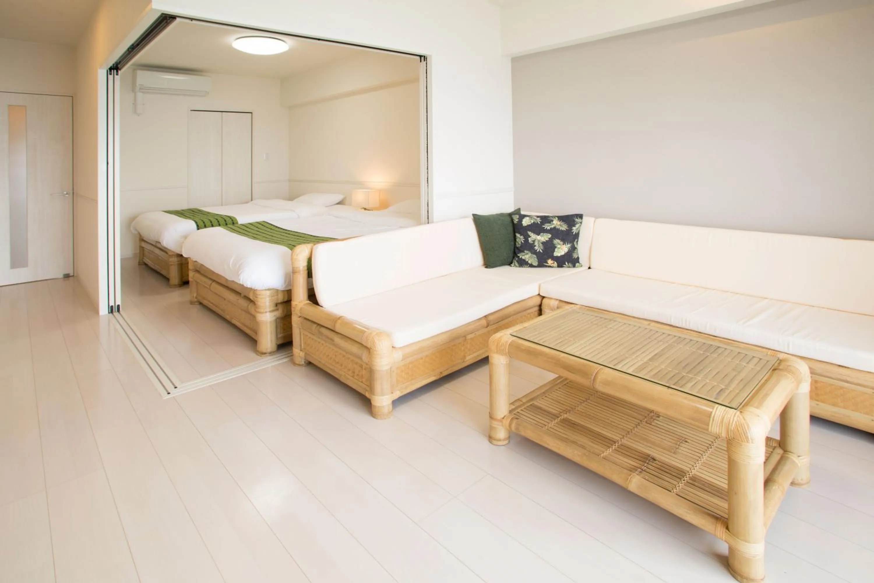 Living room, Bed in Costa Bella Condominium Resort