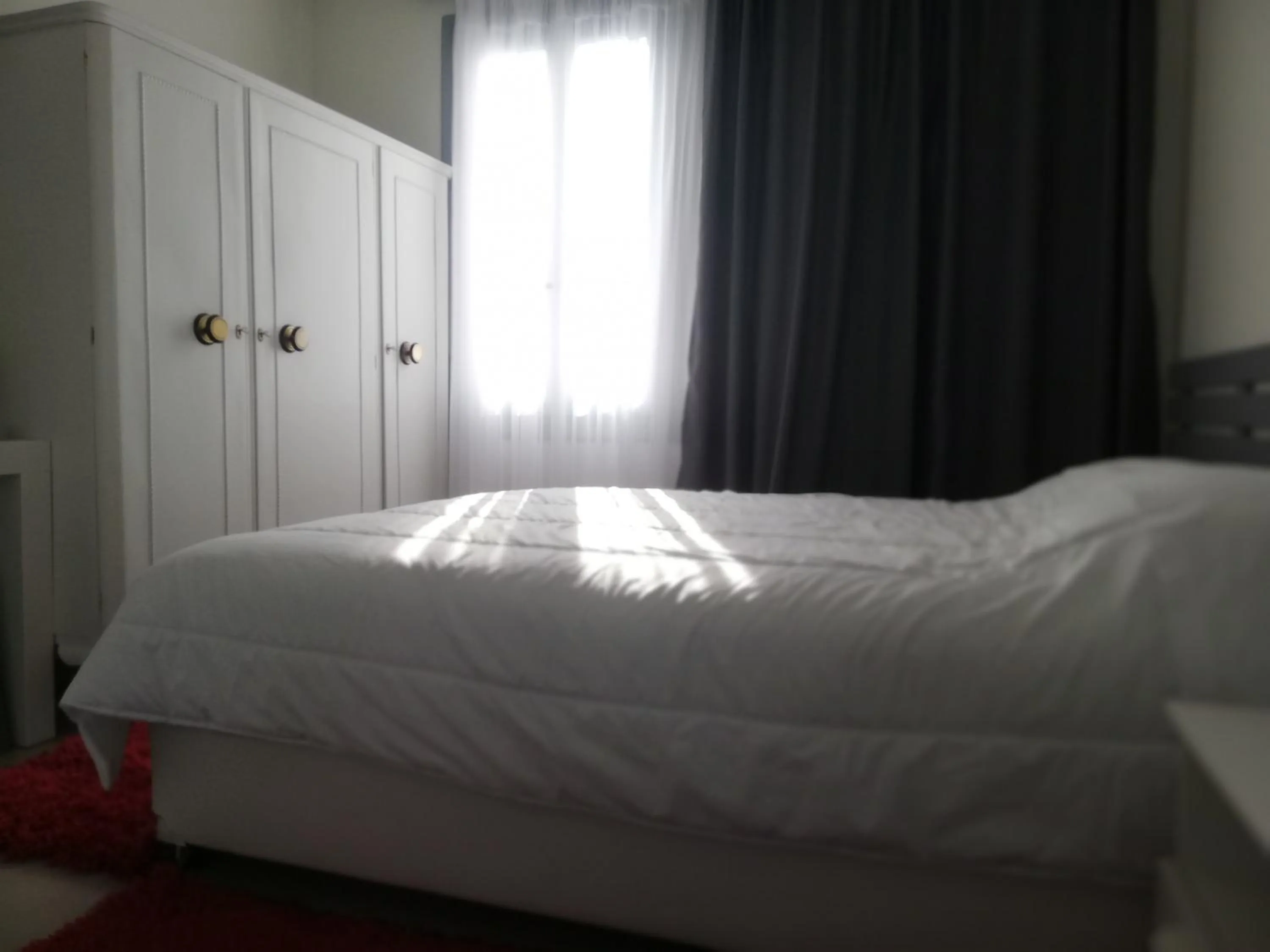 Bed in Boutique Rooms "O"