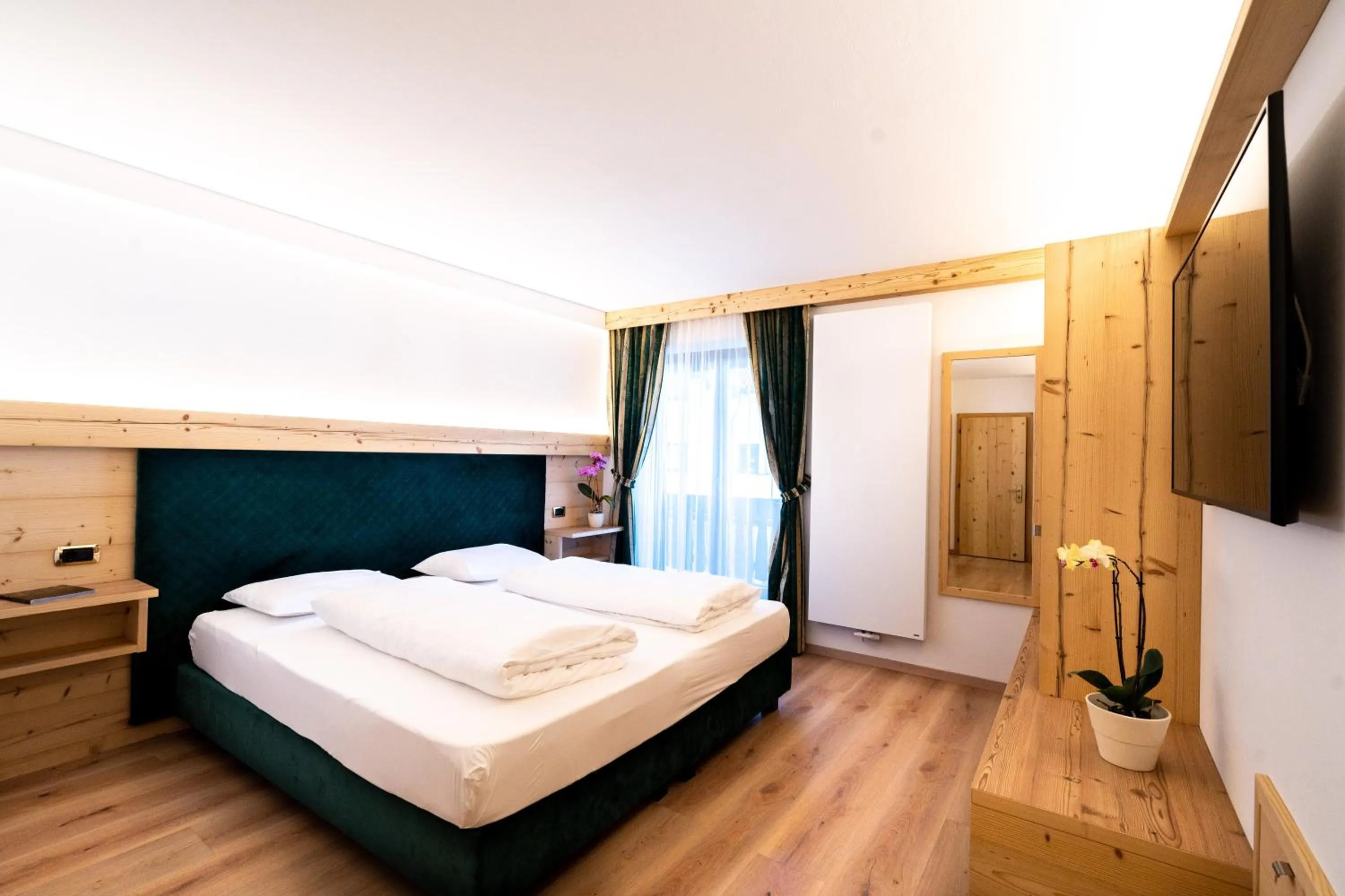 Photo of the whole room, Bed in Garni Hotel and Apartments Wildbach