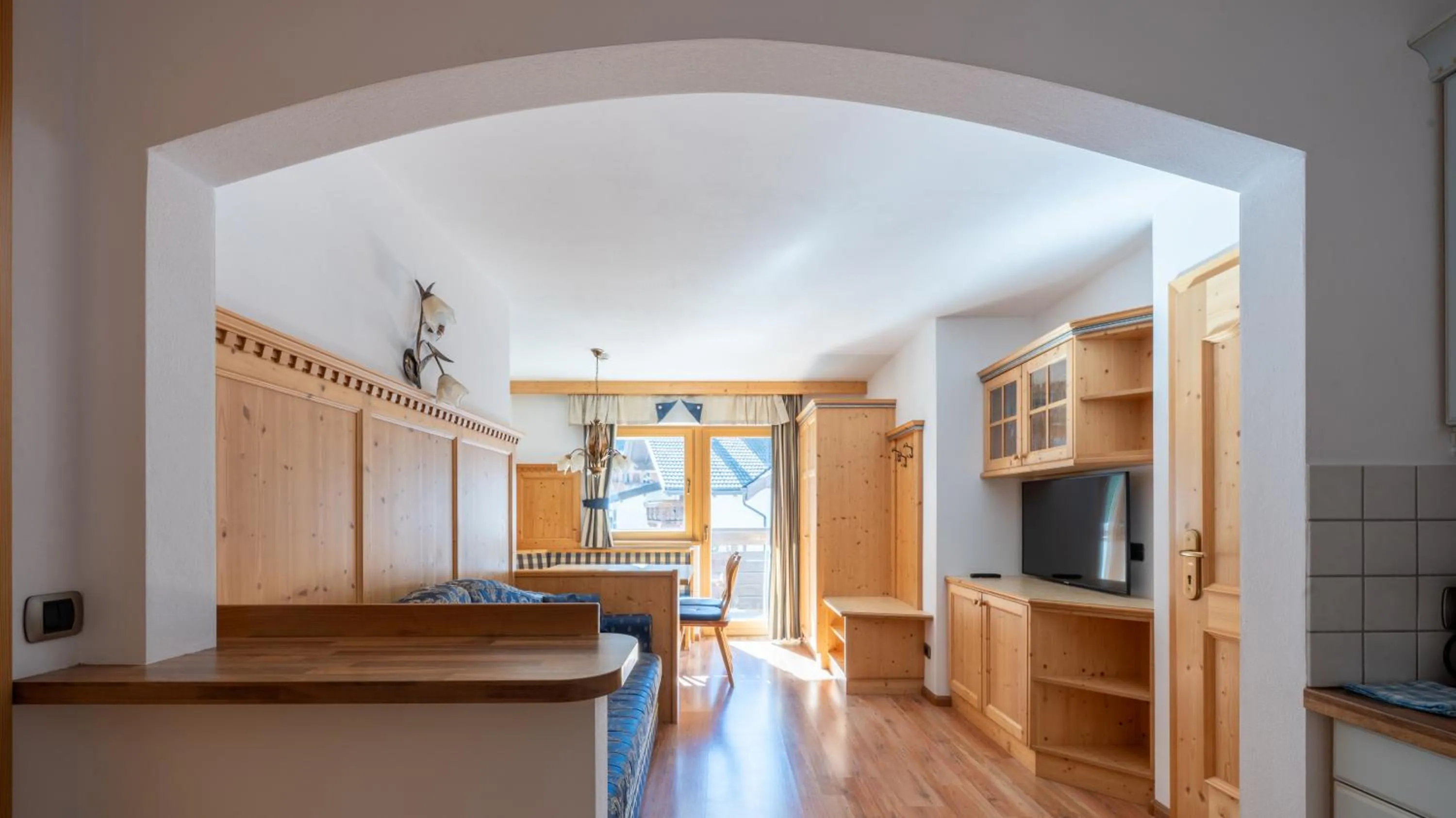 Communal lounge/ TV room in Garni Hotel and Apartments Wildbach