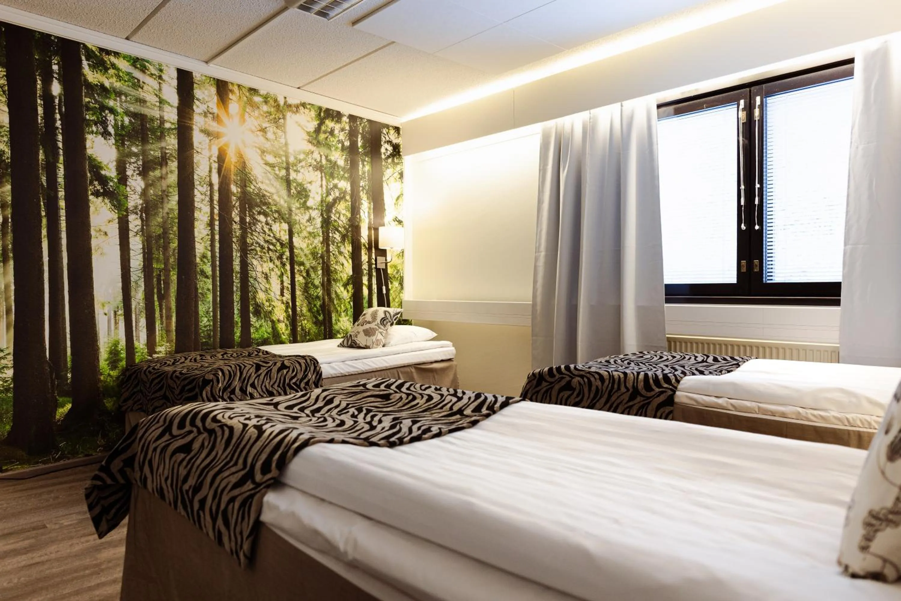 Bed in Hotel Sorsanpesä