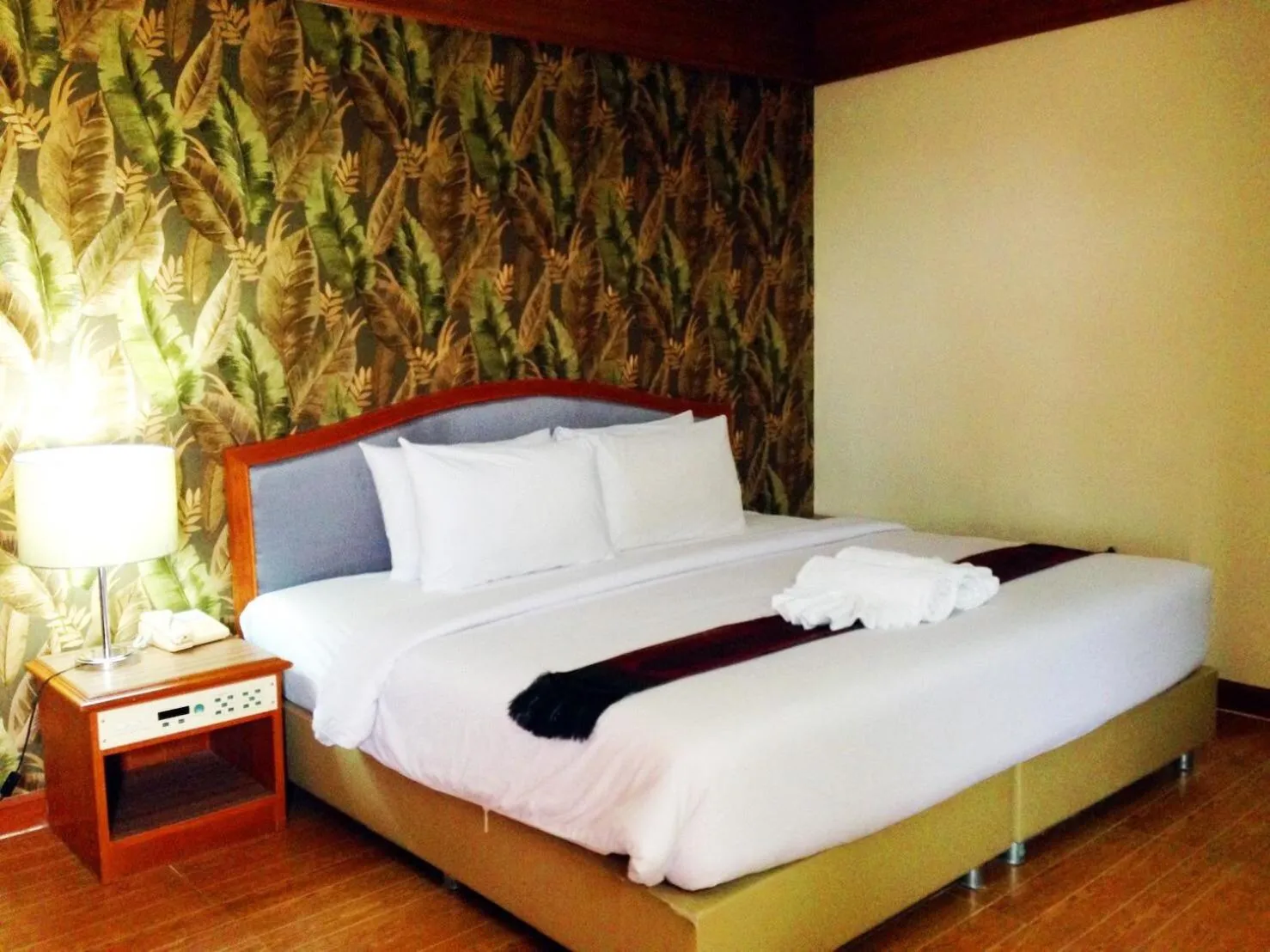 Bed in JP Emerald Hotel