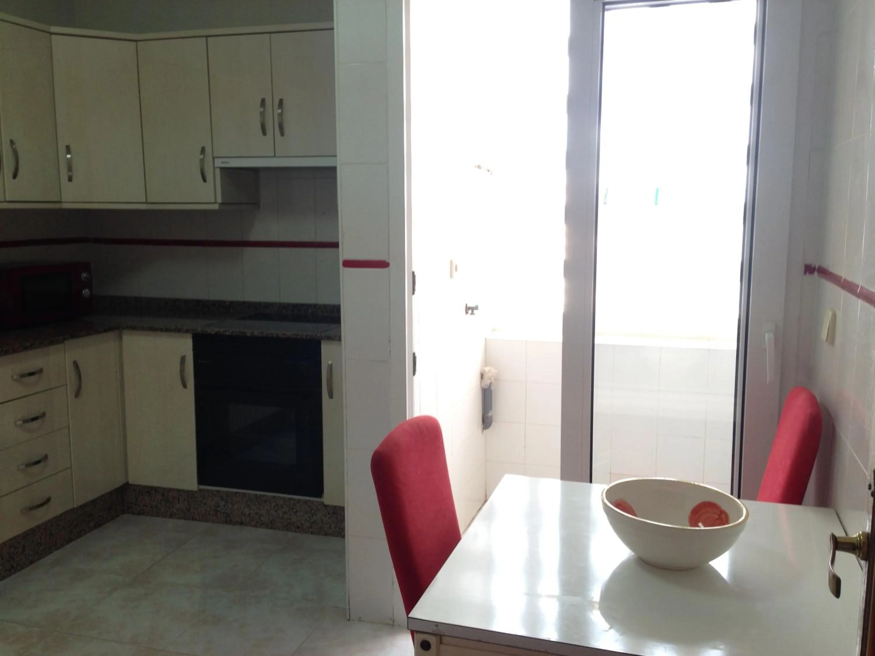 Kitchen or kitchenette in Apartamentos Copacabana Playa