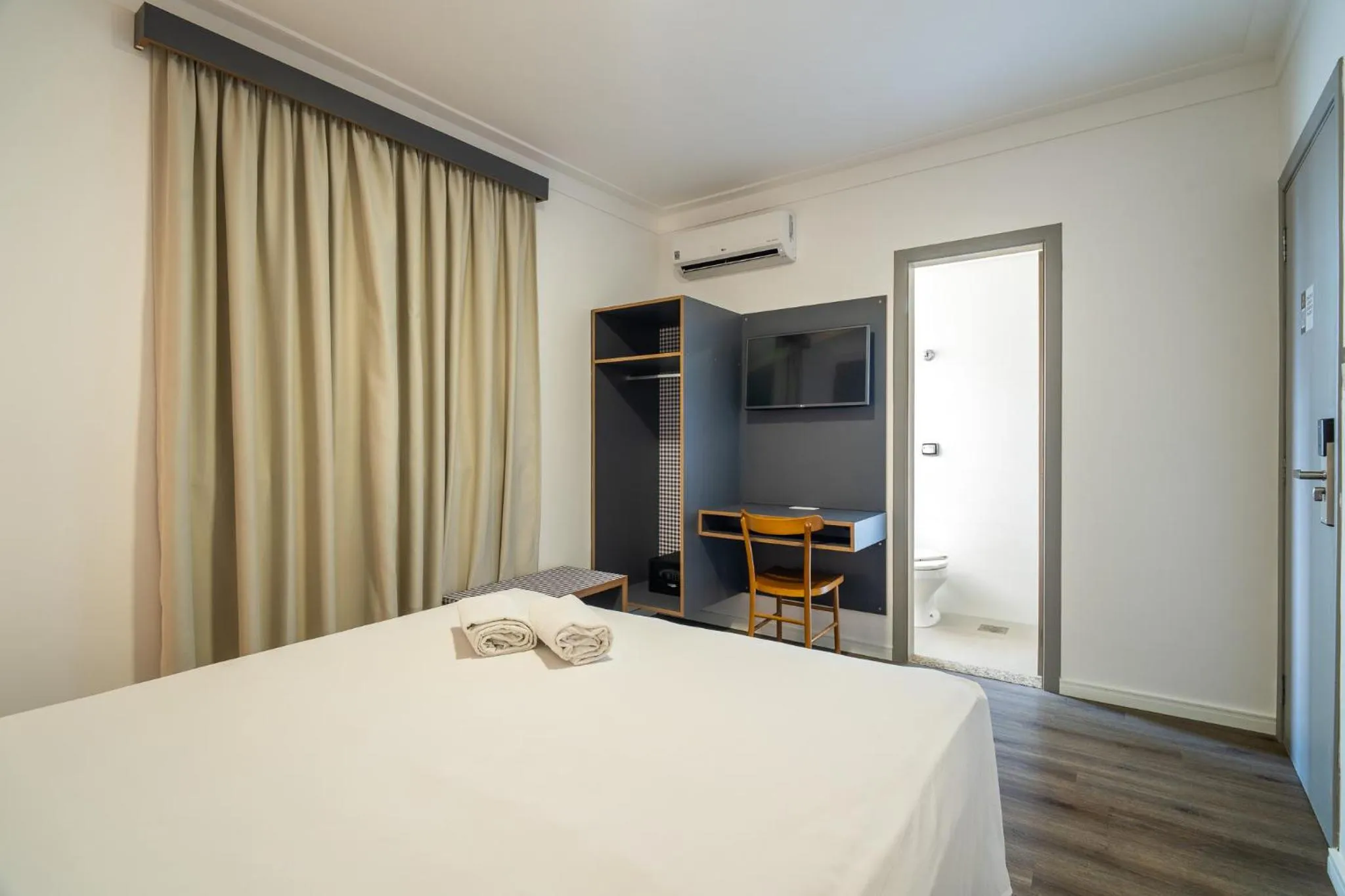 Bed in Uniclass Hotel Lapa