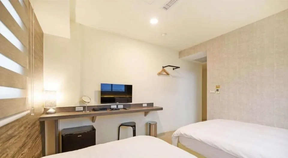 Photo of the whole room, Bed in Huaxin Hotel