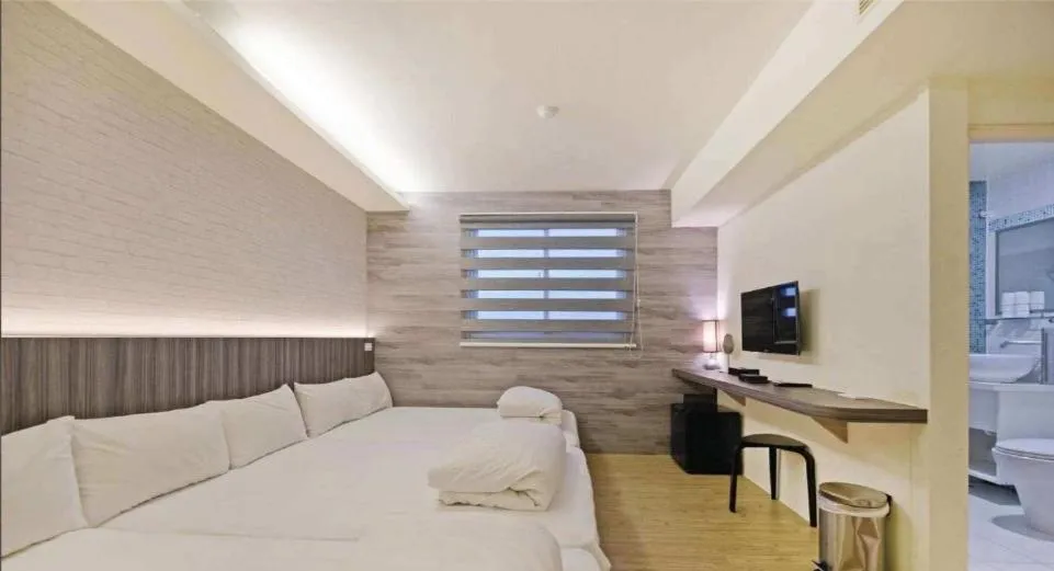 Photo of the whole room, Bed in Huaxin Hotel