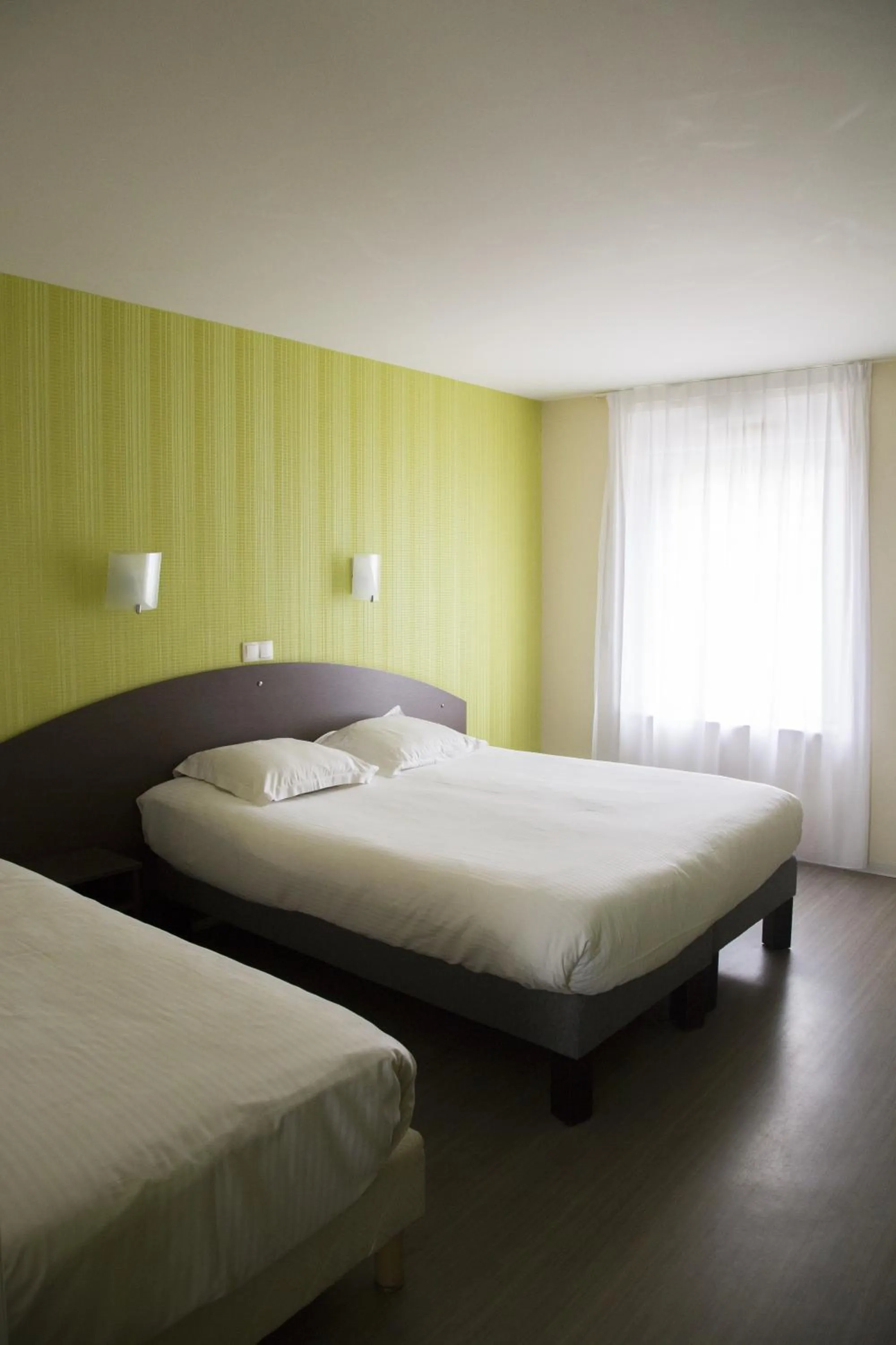 Bed in Auberge de la Baie