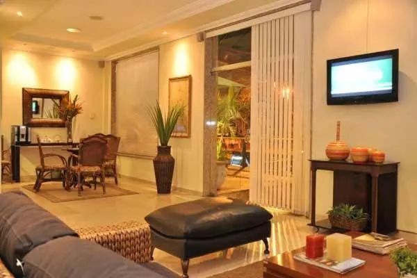Communal lounge/ TV room in Hotel Montana Serra Negra