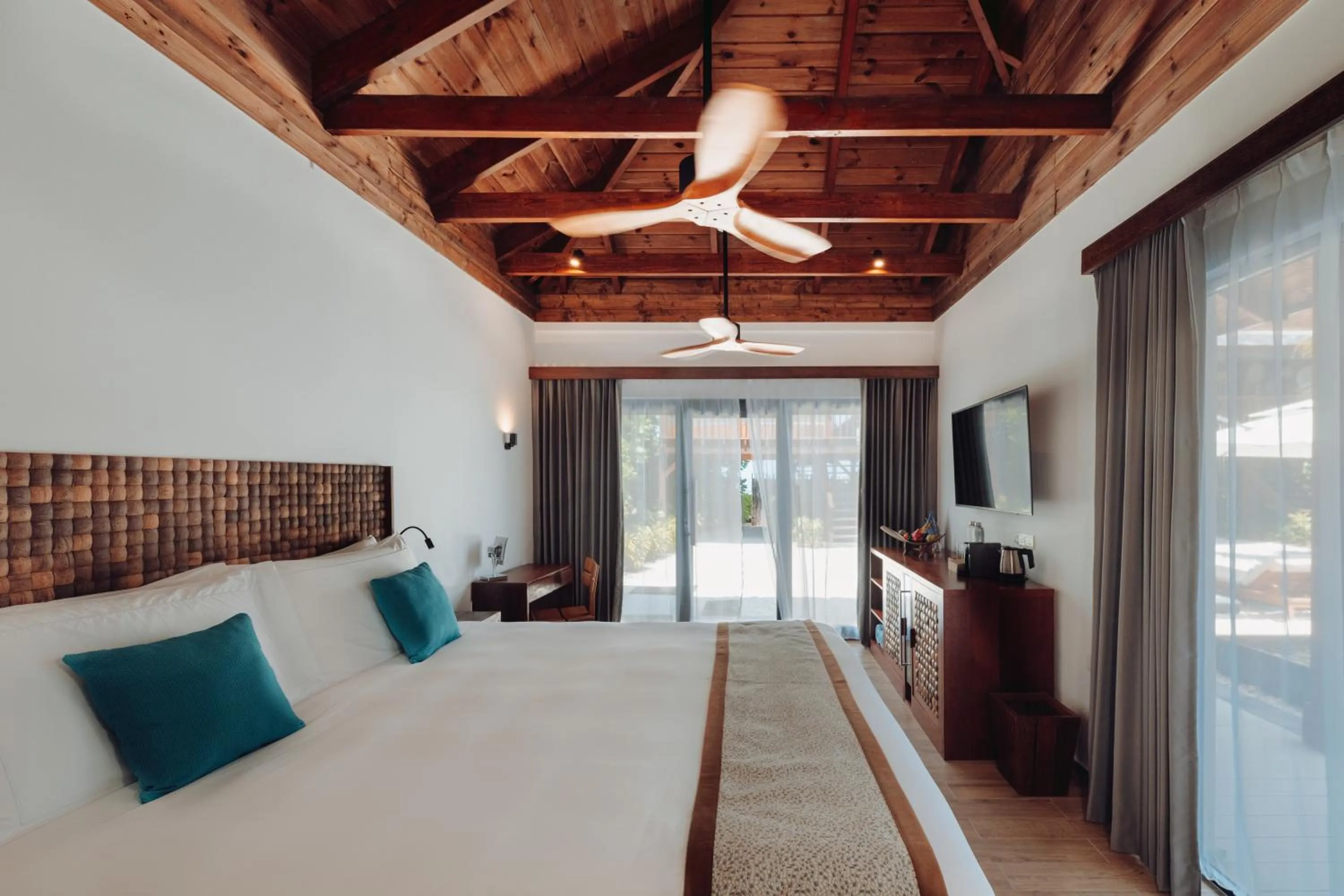 Bedroom, Bed in Kuredhivaru Resort and Spa - Maldives